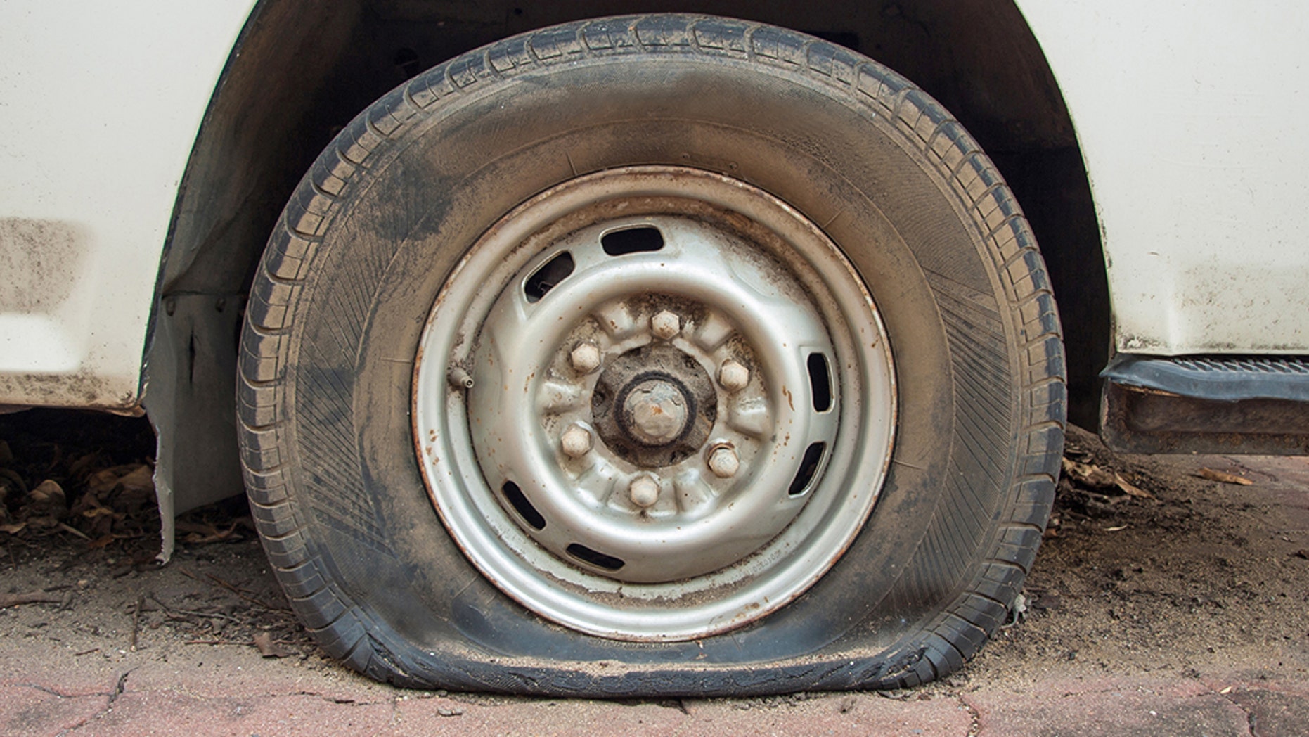 A police chief in Palestine was suspended for helping a group of Israeli soldiers change a flat tire. (istock)