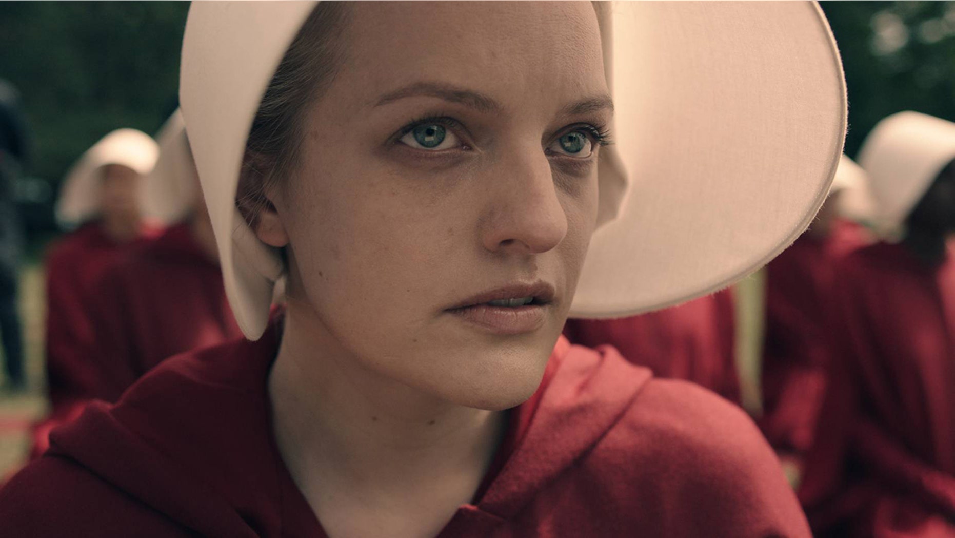 Elisabeth Moss stars as Offred in Hulu's "The Handmaid's Tale" based on Margaret Atwood's book.