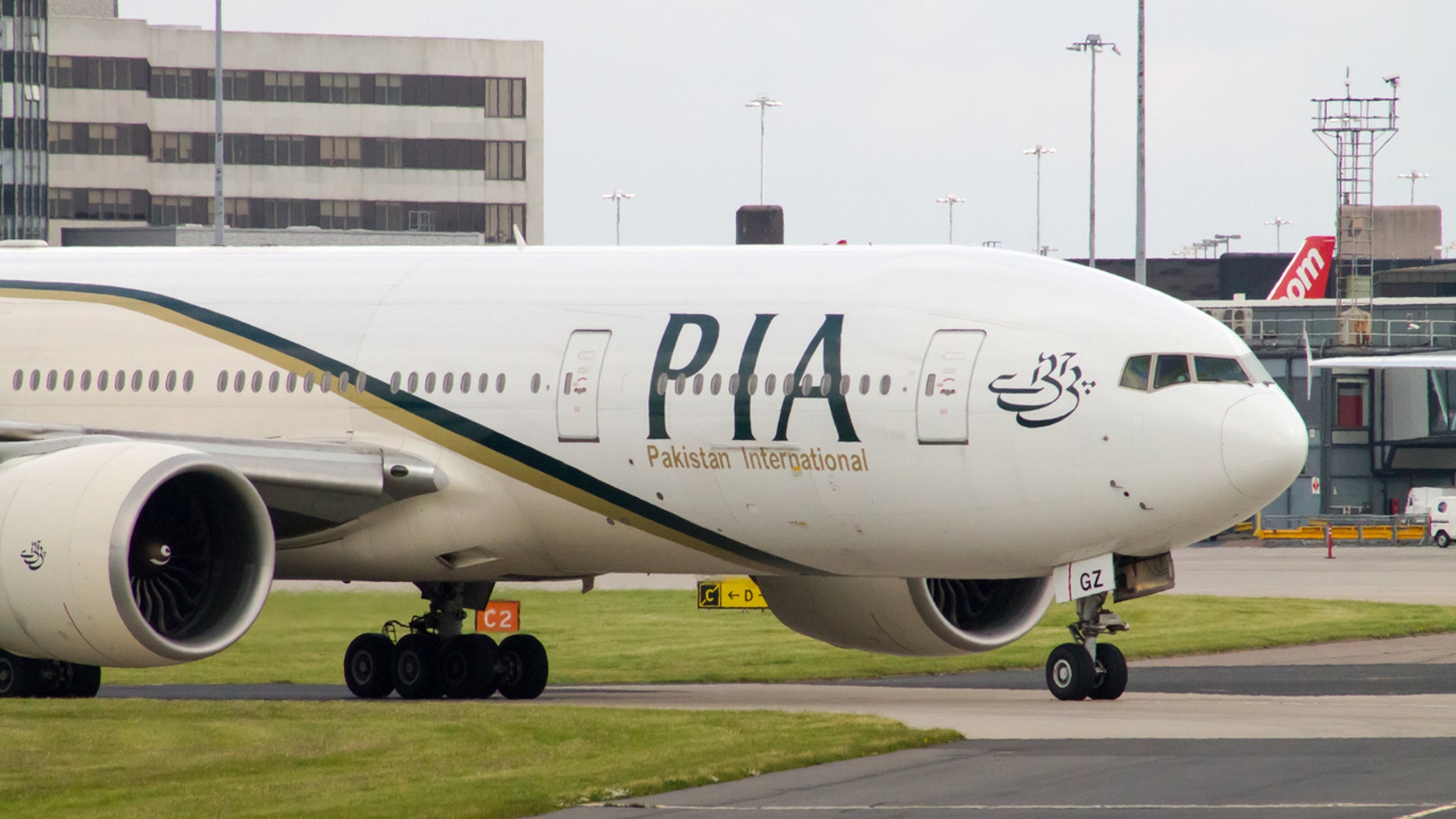 A Pakistan International Airlines customer was so upset with his flight, he tried to burn his clothes.