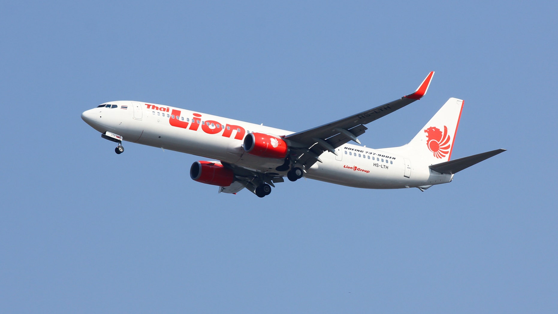 Chiangmai, Thailand - February 26, 2014: HS-LTH Boeing 737-900ER of Thai lionair airline , landing to Chiangmai airport from Bangkok Don Muang Airport, thailand.
