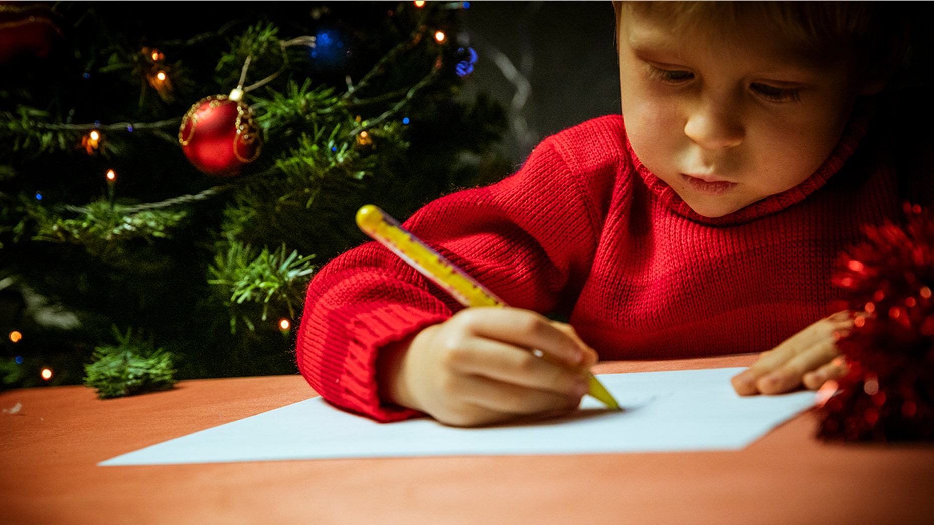 A little boy who wrote a letter to his dad in heaven got a sweet reply from the post office saying it had been sent.