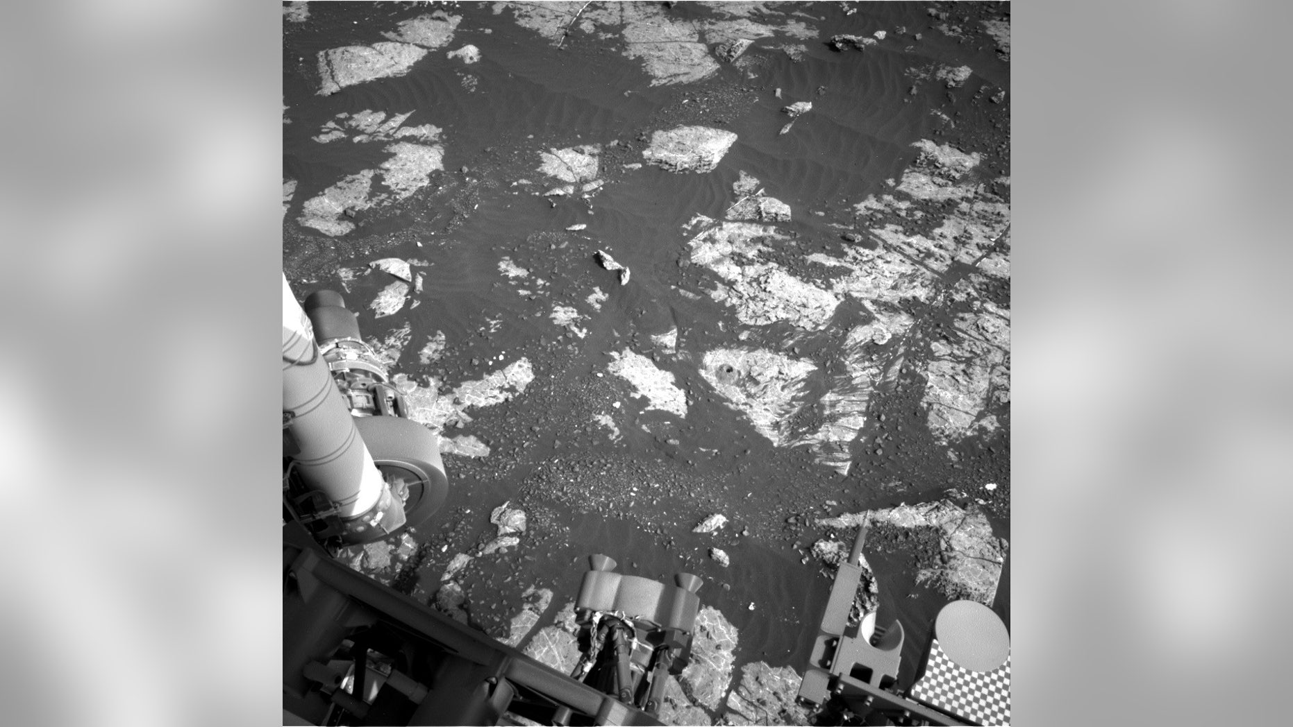 An image taken by the Curiosity rover of the 18th hole it has drilled on Mars.