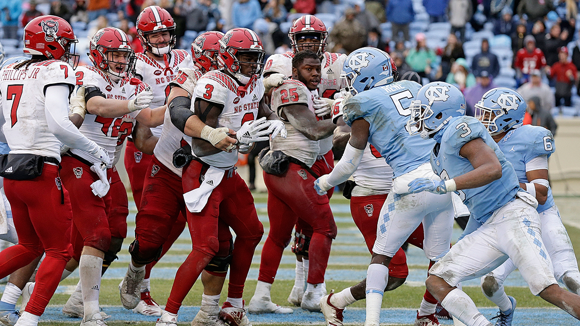 North Carolina, NC State football game ends in brawl after overtime win