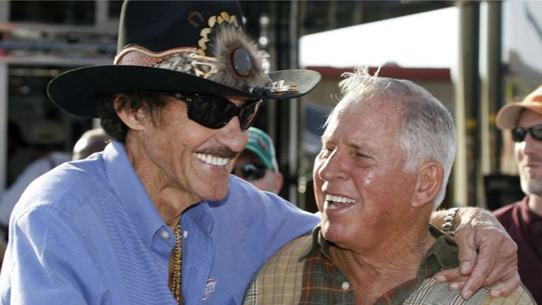 Pearson (r) is second to Richard Petty (l) on the all-time NASCAR wins list.
