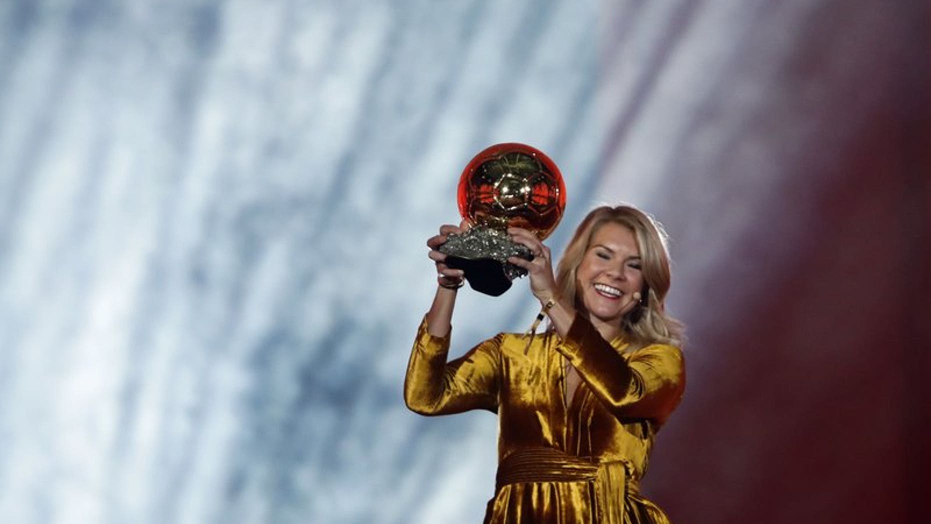Olympique Lyonnais' Ada Hegerberg celebrates with the Women's Ballon d'Or award during the Golden Ball award ceremony at the Grand Palais in Paris,