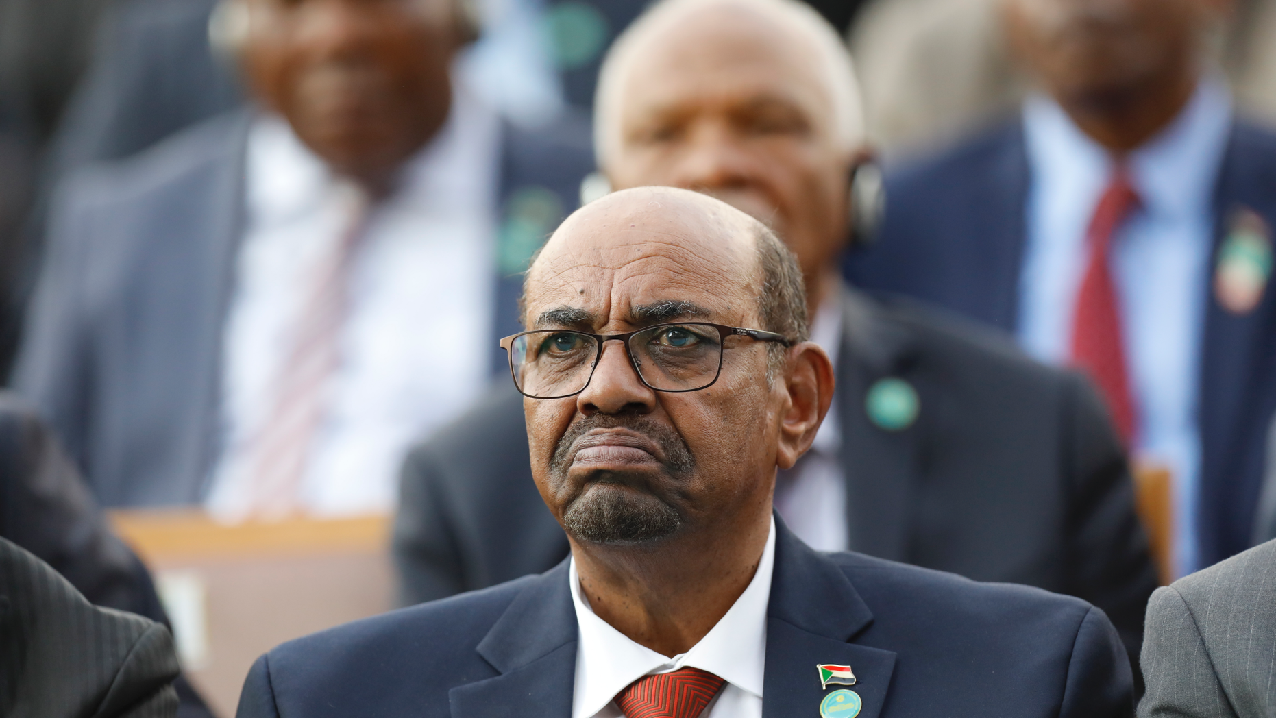 FILE - In this July 9, 2018 file photo, Sudan's President Omar Bashir attends a ceremony for Turkey's President Recep Tayyip Erdogan, at the Presidential Palace in Ankara, Turkey. An umbrella of independent professional unions on Sunday, Dec. 30, 2018 is calling on people to march on the presidential palace in Sudan’s capital, Khartoum, to demand that autocratic President Omar Bashir step down. (AP Photo/Burhan Ozbilici, File)
