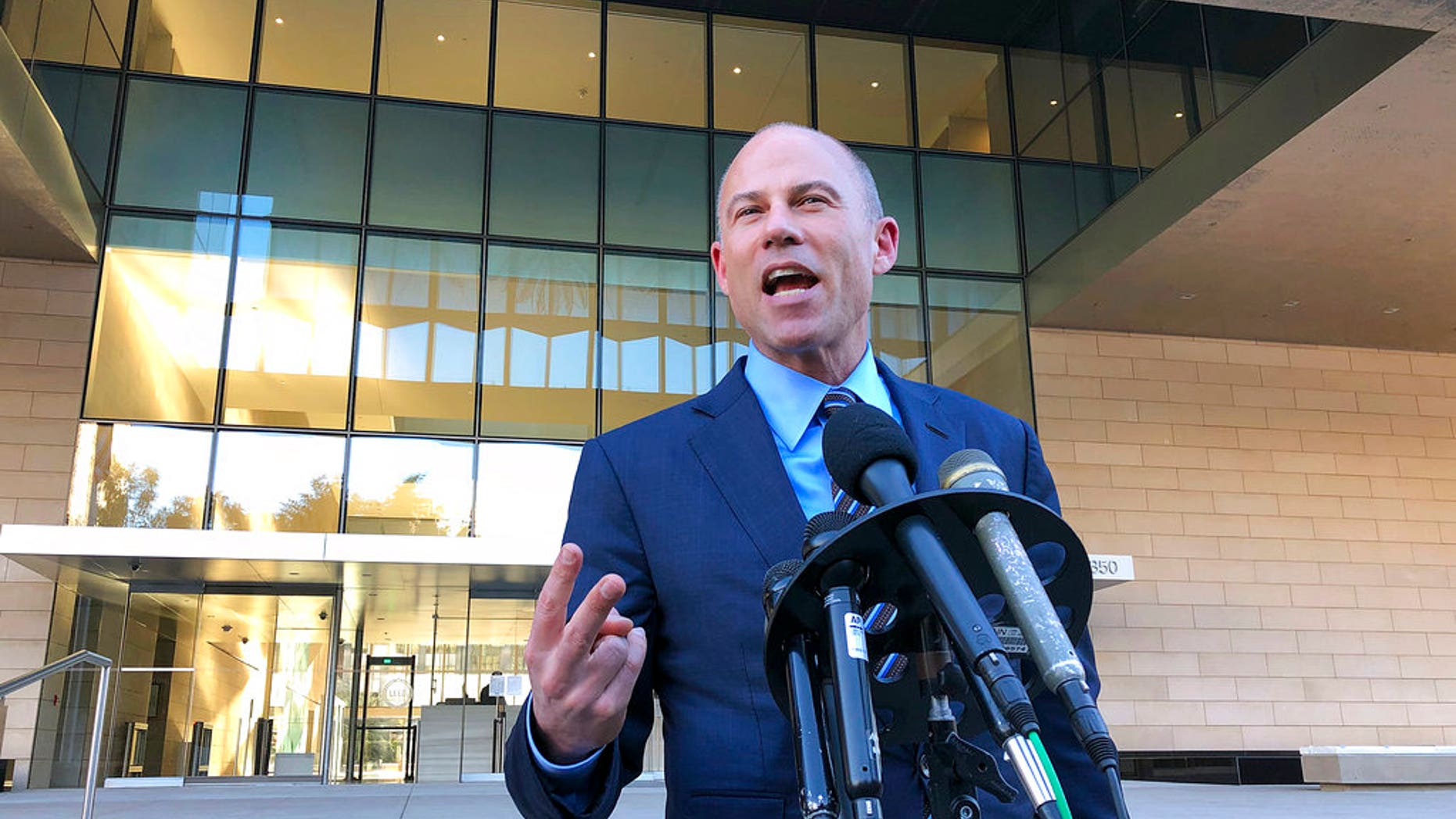 Michael Avenatti, lawyer for porn actress Stormy Daniels, speaks to reporters outside federal court in Los Angeles, Dec. 3, 2018.