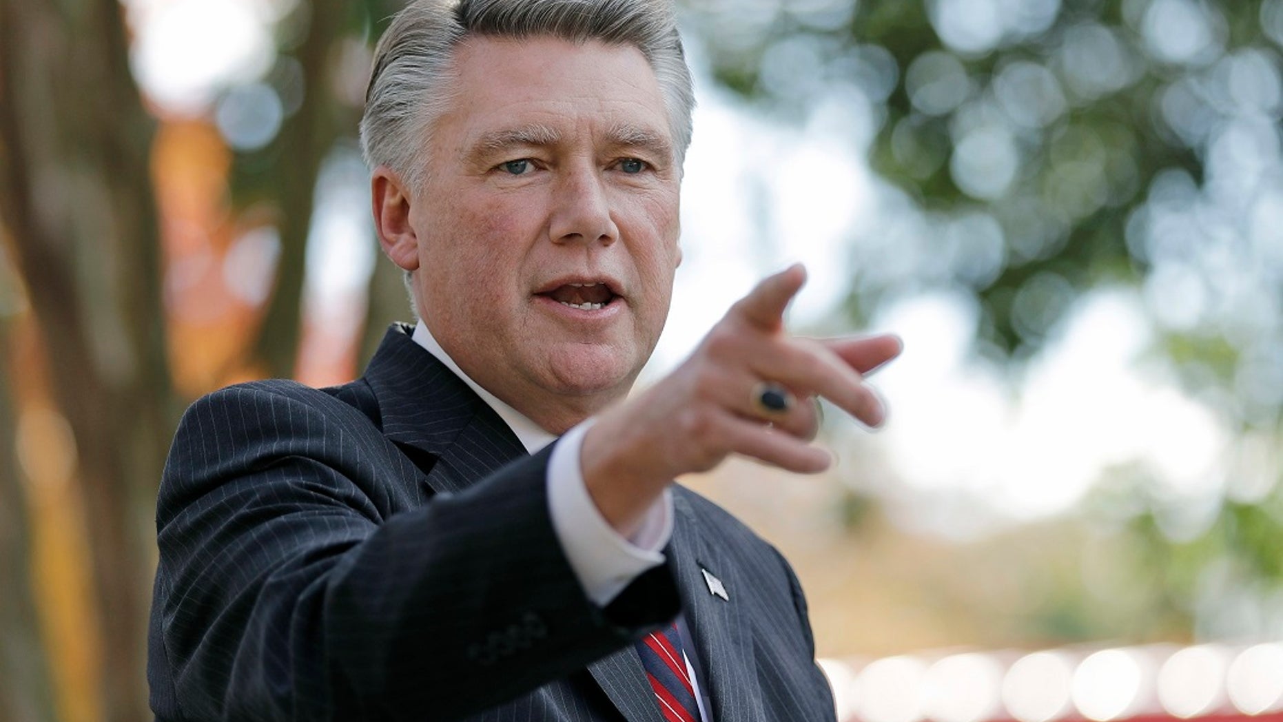 Mark Harris speaks to the media during a news conference in Matthews, N.C.