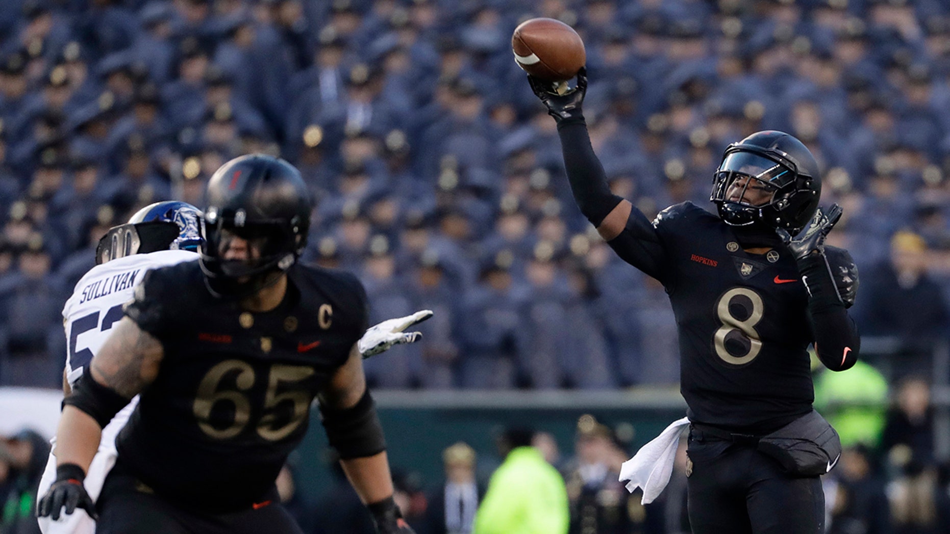 Army's Kelvin Hopkins Jr. throws a pass during the first half of an NCAA college football game against Navy, Saturday, Dec. 8, 2018, in Philadelphia. (AP Photo/Matt Slocum)