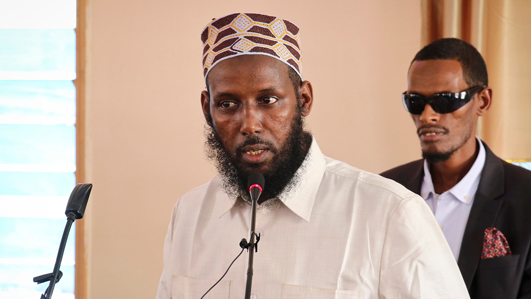 Mukhtar Robow, who was once deputy leader of Africa's deadliest Islamic extremist group the al-Qaida-linked al-Shabab, was arrested and beaten, sparking violent protests that left at least four dead. (AP Photo/File)