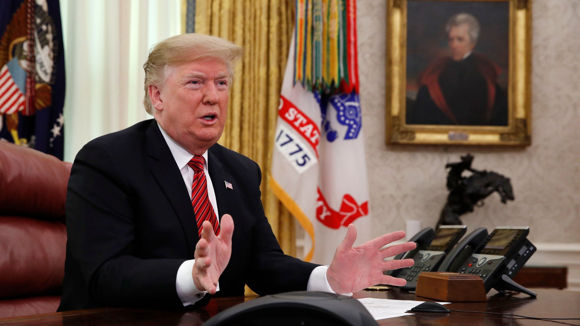 President Trump greets members of the five branches of the military by video conference on Christmas Day. (Associated Press)