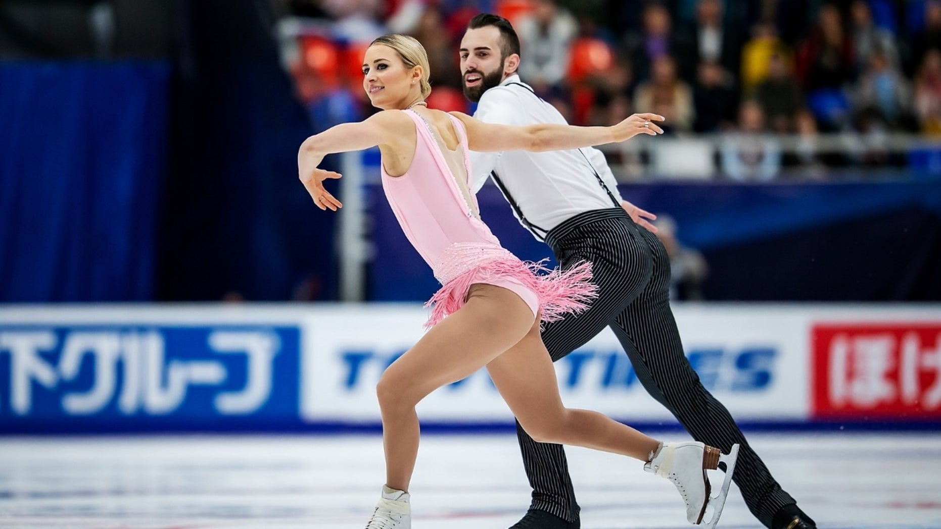 Ashley Cain and Timothy Leduc skating in Moscow, Russia, in Nov 2018.