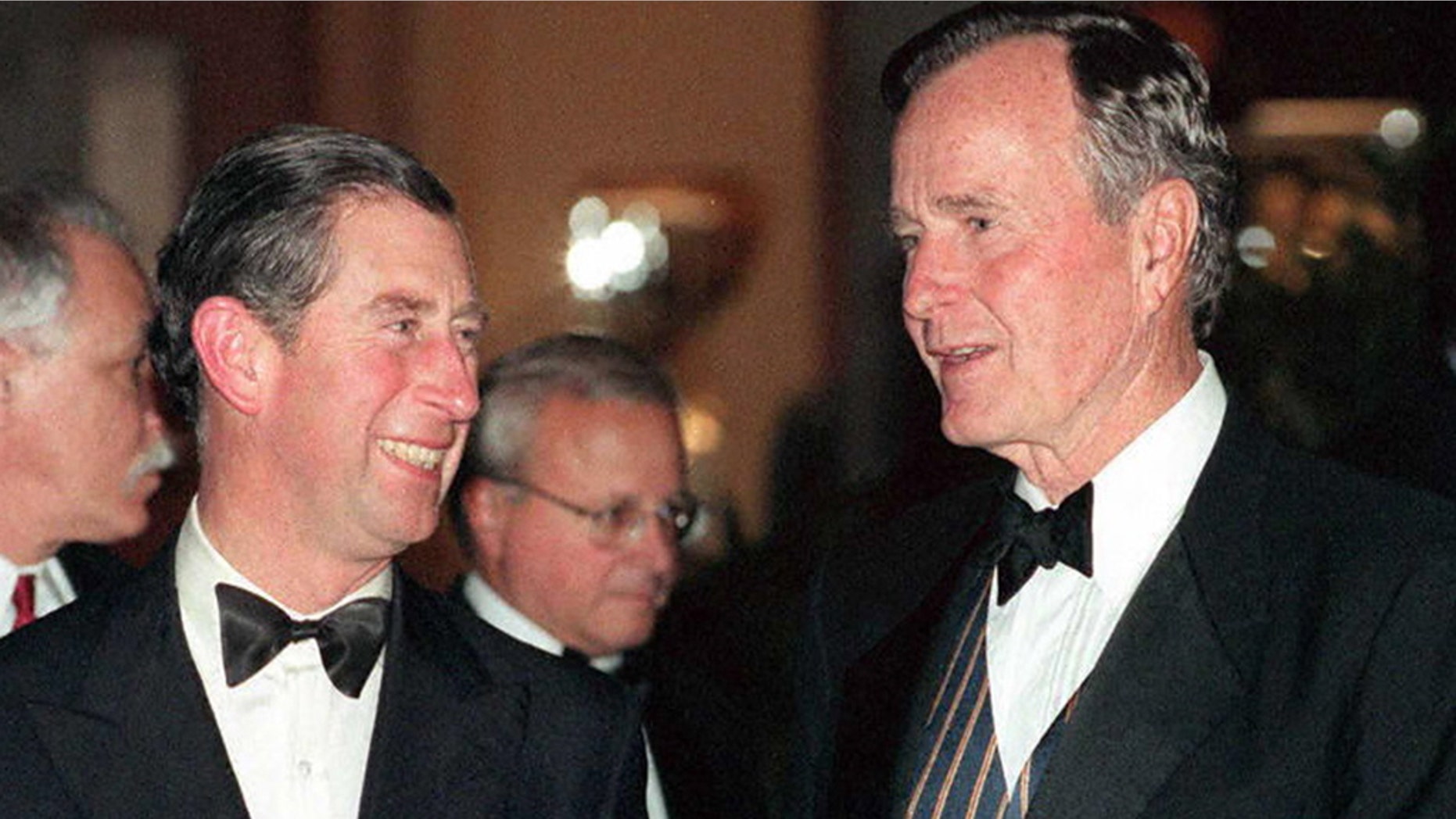 Prince Charles and former President George H.W. Bush pictured here in 1997.