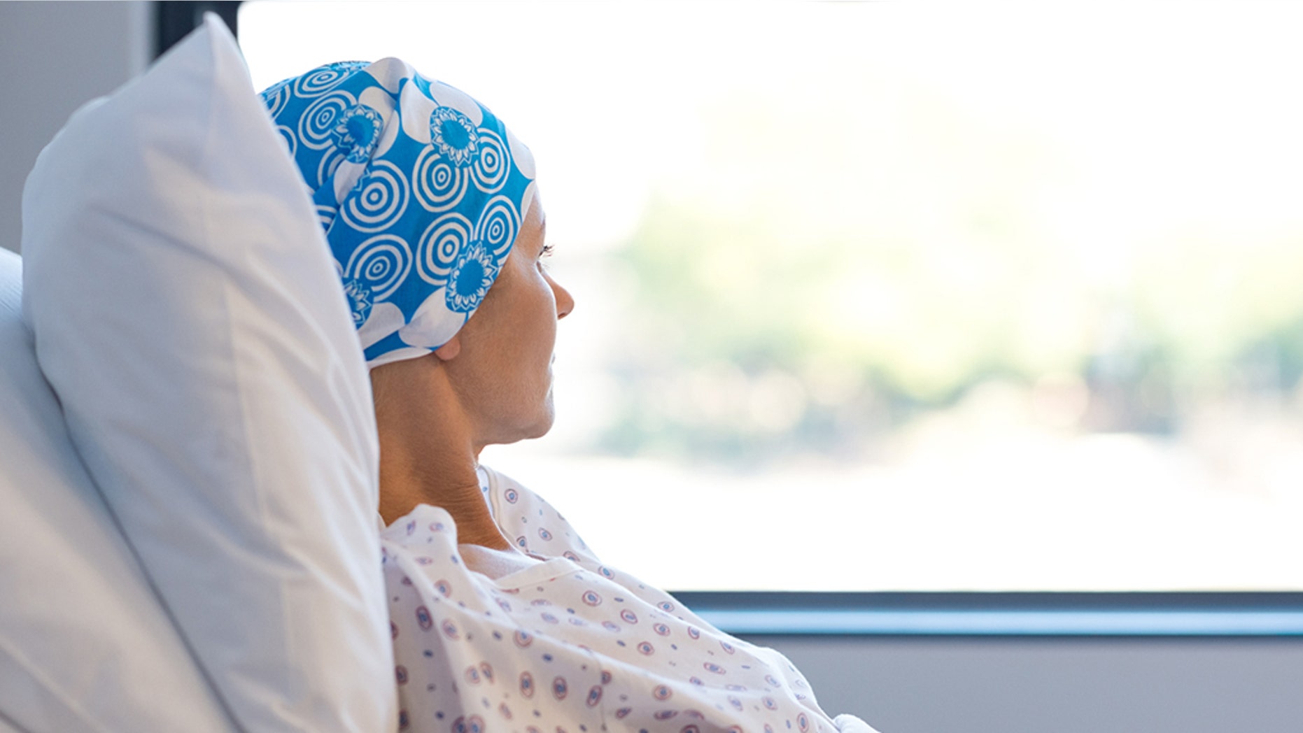 The woman in Ohio claims she is now free of cancer after the clinical trial.