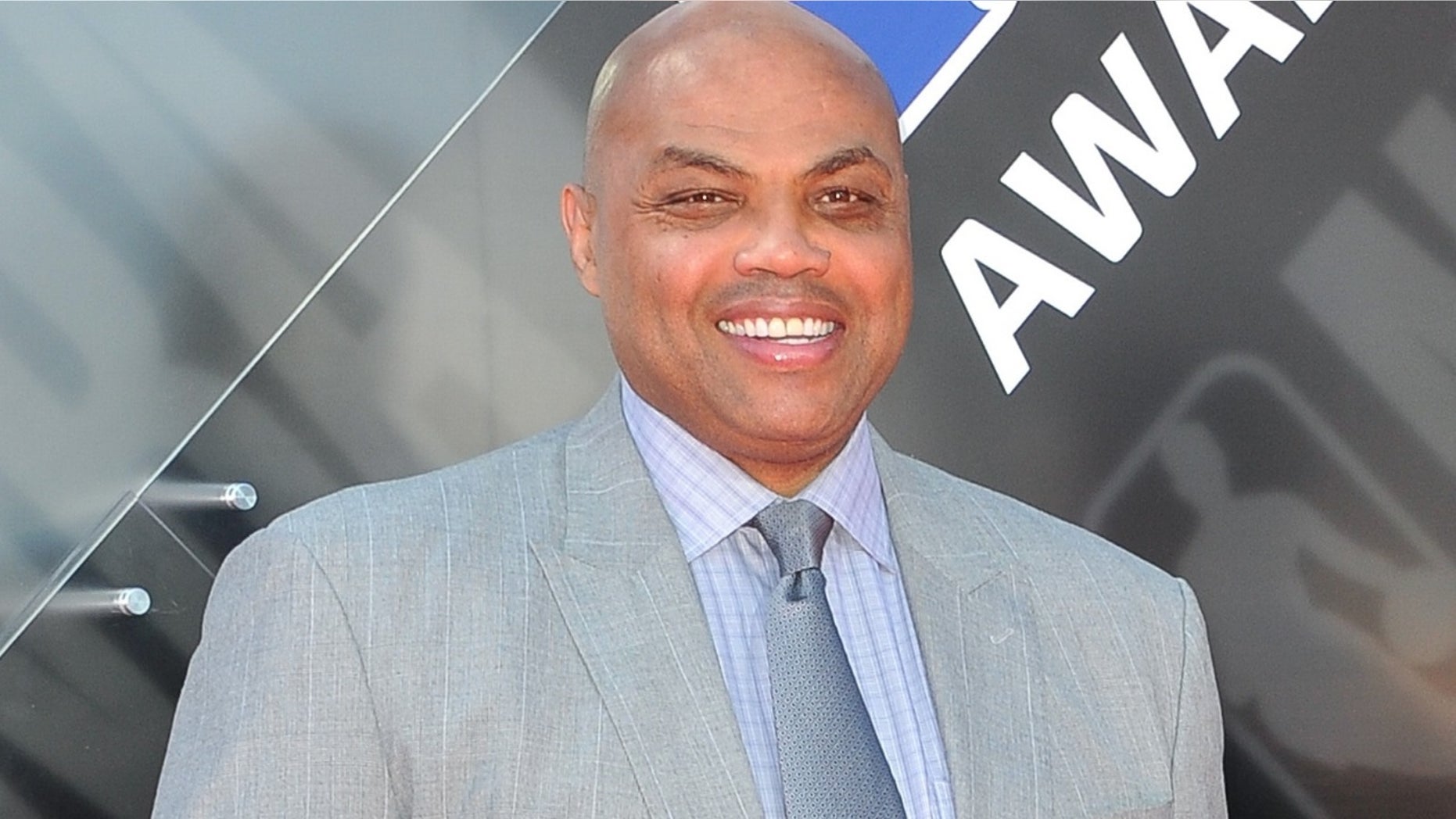 Charles Barkley and Lin Wang met years ago at a hotel in Sacramento years ago before becoming friends.