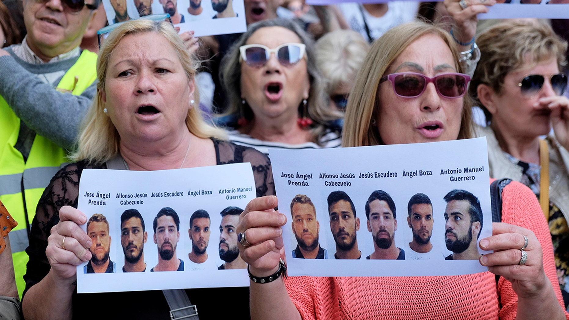 People scream slogans while holding signs during a criticism outward a City of Justice, after a Spanish justice on Thursday condemned 5 organisation indicted of a organisation rape of an 18-year-old lady during a 2016 San Fermin bull-running festival any to 9 years in jail for a obtuse assign of passionate abuse, in Valencia, Spain Apr 27, 2018. REUTERS/Heino Kalis? - RC121CBBB710