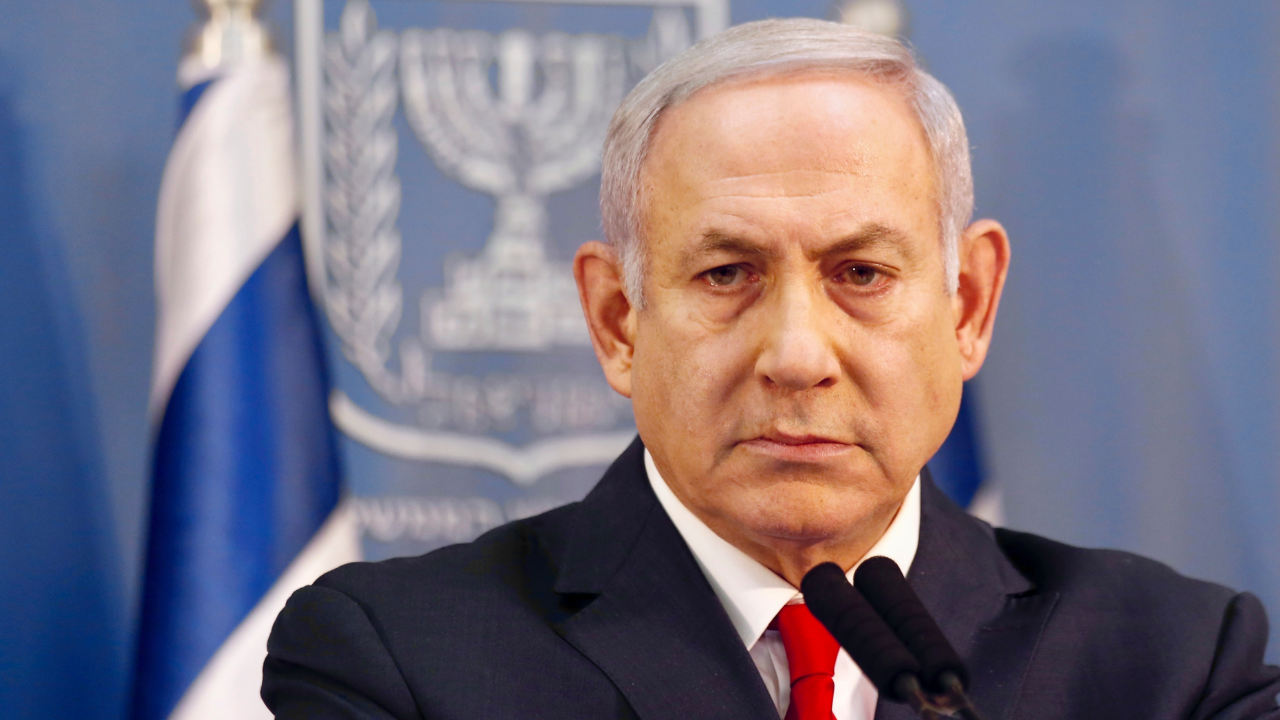 FILE - In this Nov. 18, 2018 file photo, Israeli Prime Minister Benjamin Netanyahu delivers a statement in Tel Aviv. (AP Photo/Ariel Schalit, File)