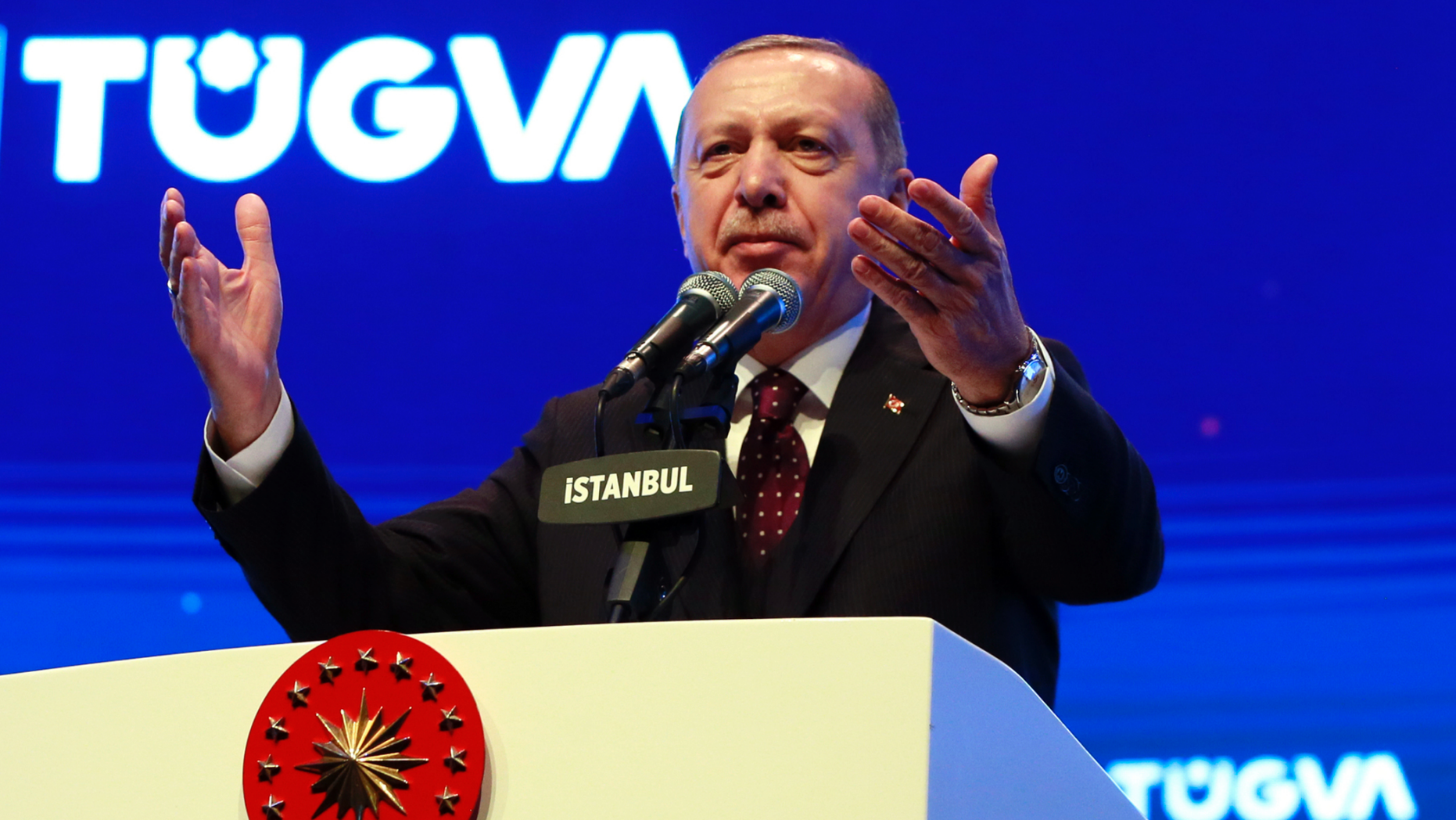 Turkey's President Recep Tayyip Erdogan addresses a meeting of a youth organisation founded by his elder son Bilal Erdogan and his friends, in Istanbul Saturday, Dec. 22, 2018. Erdogan said Friday the United States decided to withdraw troops from Syria after he reassured U.S. President Donald Trump that Turkey could eradicate the remnants of Islamic State group from the country with logistical help from Washington.(Presidential Press Service via AP, Pool)