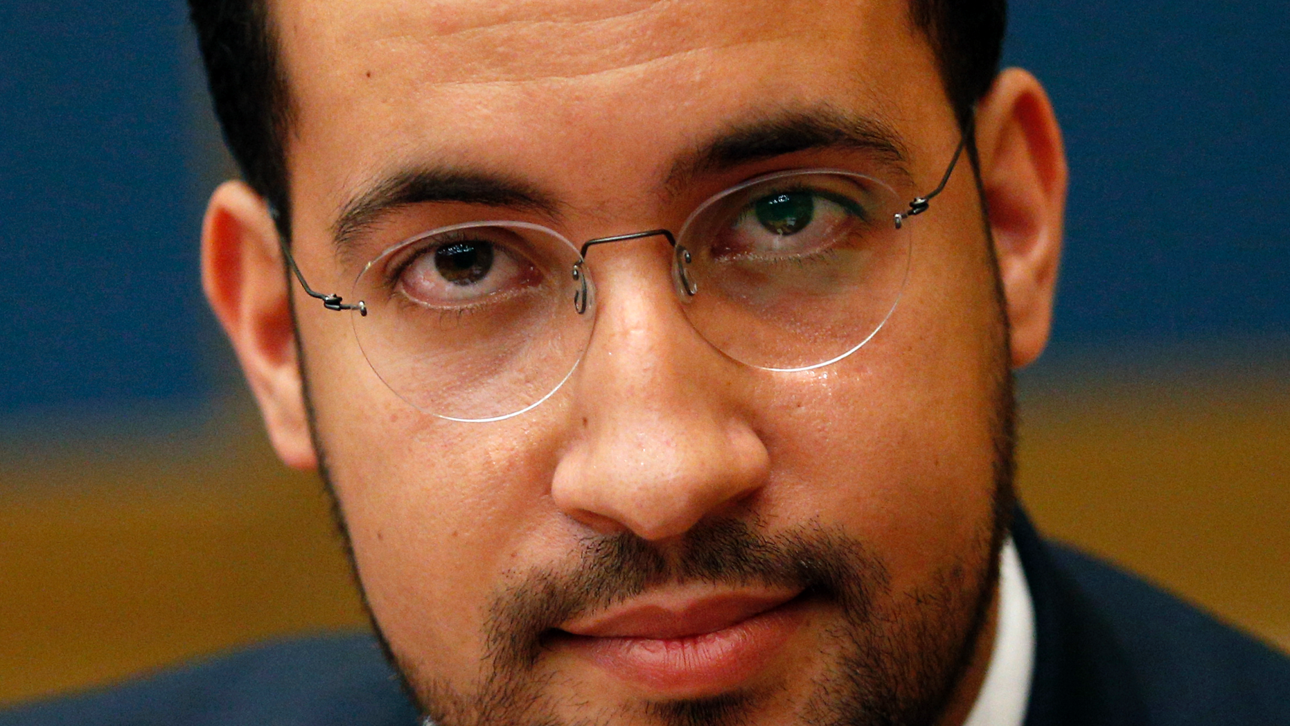 FILE - In this Wednesday, Sept. 19, 2018 file picture former President Macron's security aide Alexandre Benalla appears before the French Senate Laws Commission prior to his hearing, in Paris, France. France's Foreign Ministry is threatening legal action against a former security aide to President Emmanuel Macron, amid reports that he continued using his diplomatic passports after being fired for beating a protester. (AP Photo/Thibault Camus, File)