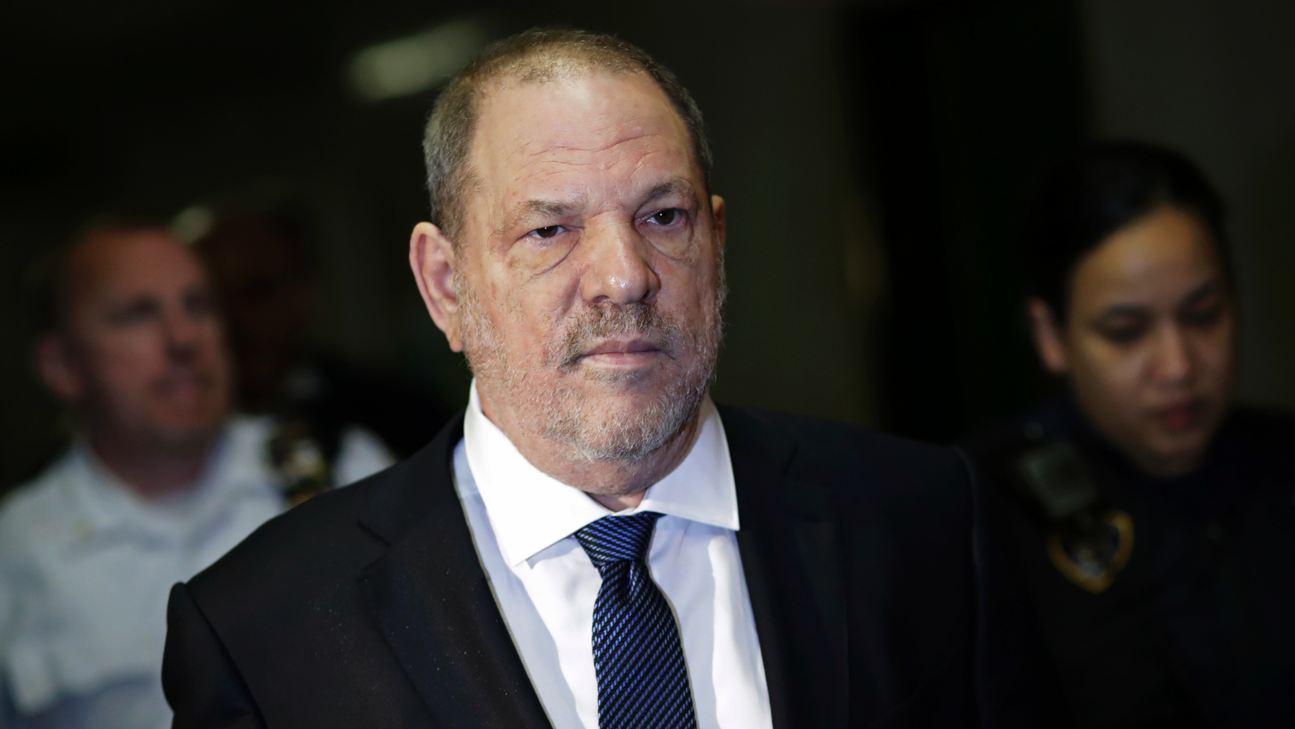 FILE - In this Oct. 11, 2018 file photo, Harvey Weinstein enters State Supreme Court in New York. Lawyers for Weinstein say they’ve uncovered new evidence that further undermines rape allegations against him. The lawyers said Friday, Dec. 7 in a letter to the New York City judge overseeing Weinstein’s criminal case that a friend of the alleged victim has said the two attended a movie screening hosted by the former film mogul hours after prosecutors say the attack took place in 2013. (AP Photo/Mark Lennihan, File)