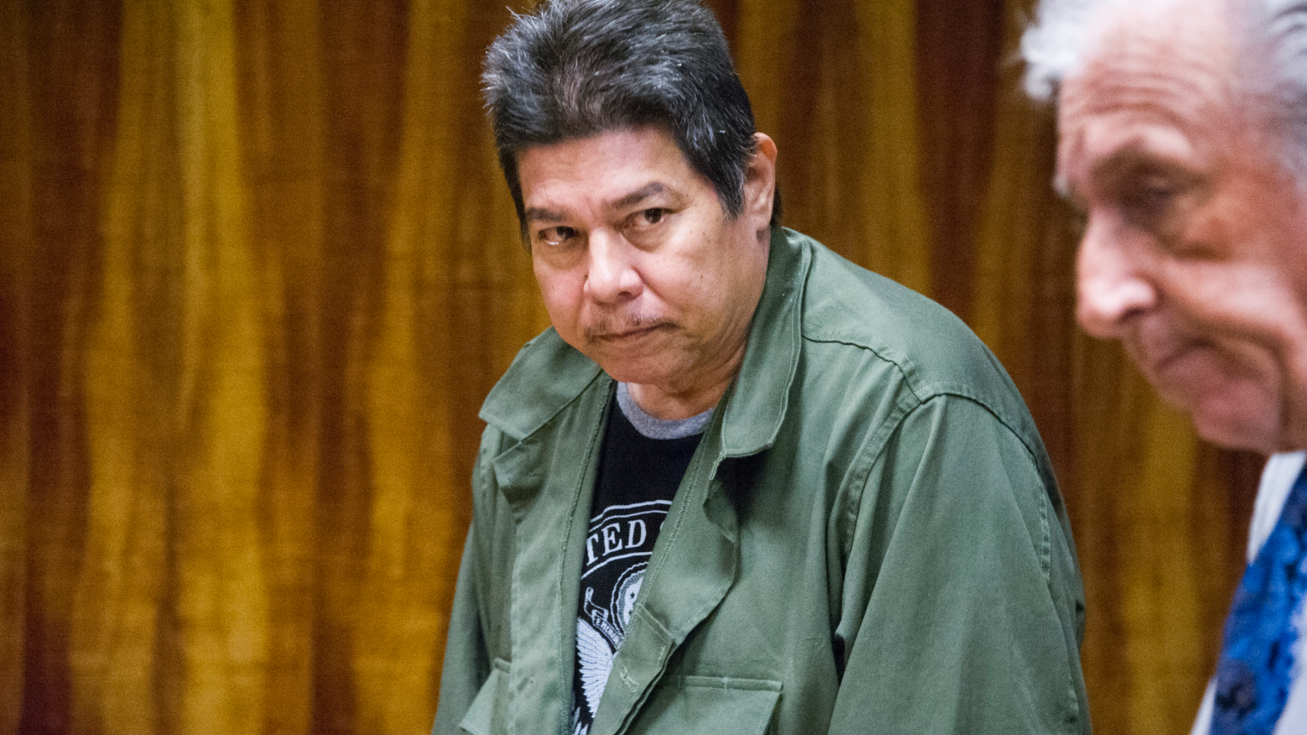FILE - In this April 26, 2018 file photo Randall Saito appears in court for a hearing on his mental competence to stand trial in Honolulu. Hawaii officials said they are ready Wednesday, Dec. 12 to discuss findings of an investigation into Saito's escape from a psychiatric hospital. The state attorney general's office has completed an administrative investigation more than a year after Saito escaped from Hawaii State Hospital. Saito was sent to the hospital in 1981 after being found not guilty by reason of insanity of killing a woman. He was captured in Stockton, California, days after walking out of the hospital last November. (Craig T. Kojima/Honolulu Star-Advertiser via AP, Pool,File)