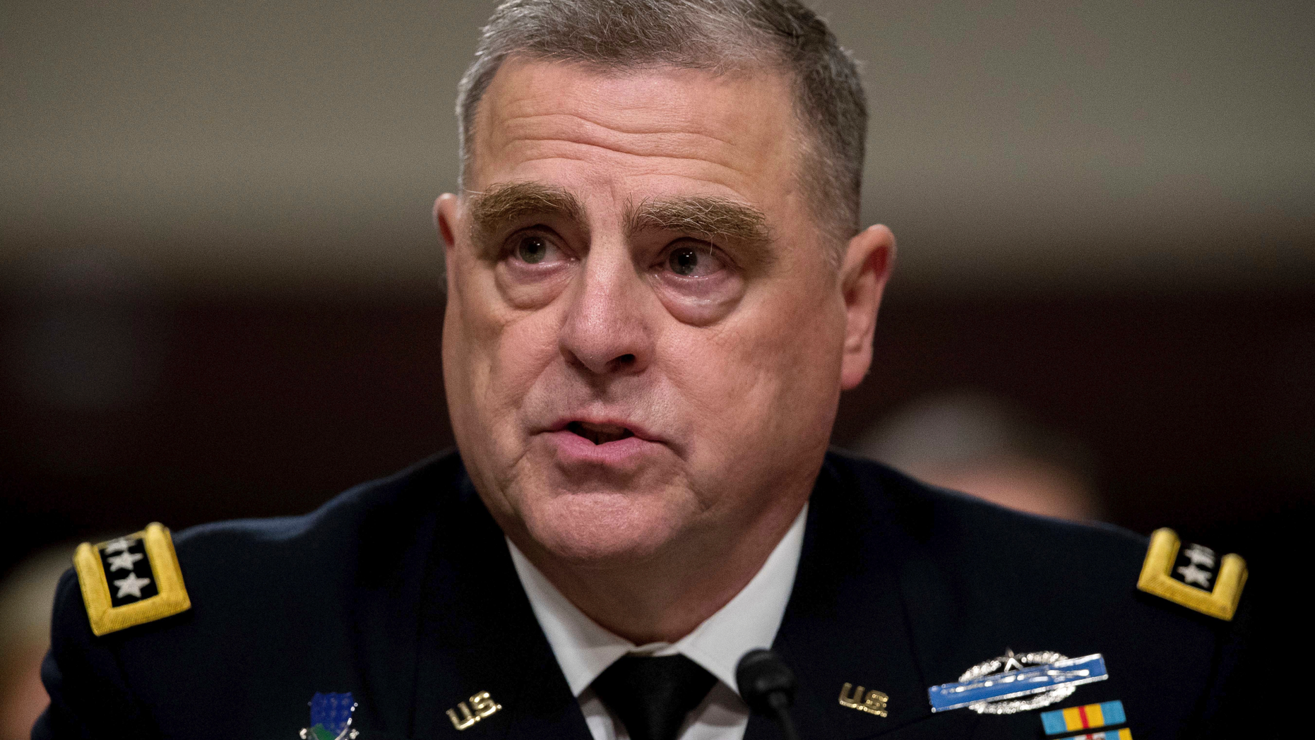 FILE - In this May 25, 2017 file photo, Army Chief of Staff Gen. Mark Milley listens to a question while testifying on Capitol Hill in Washington, before a Senate Armed Services Committee hearing on the Army's fiscal 2018 budget. President Donald Trump will tap Gen. Mark Milley as his next top military adviser, choosing a battle-hardened commander who has served as chief of the Army for the last three years, U.S. officials said Friday. (AP Photo/Andrew Harnik)