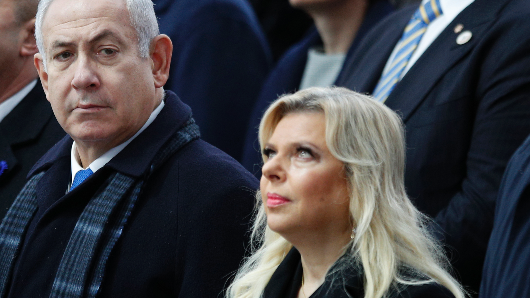 FILE - In this Nov. 11, 2018, file photo, Israeli Prime Minister Benjamin Netanyahu and his wife Sara attend ceremonies at the Arc de Triomphe in Paris. (AP Photo/Francois Mori, Pool, File)