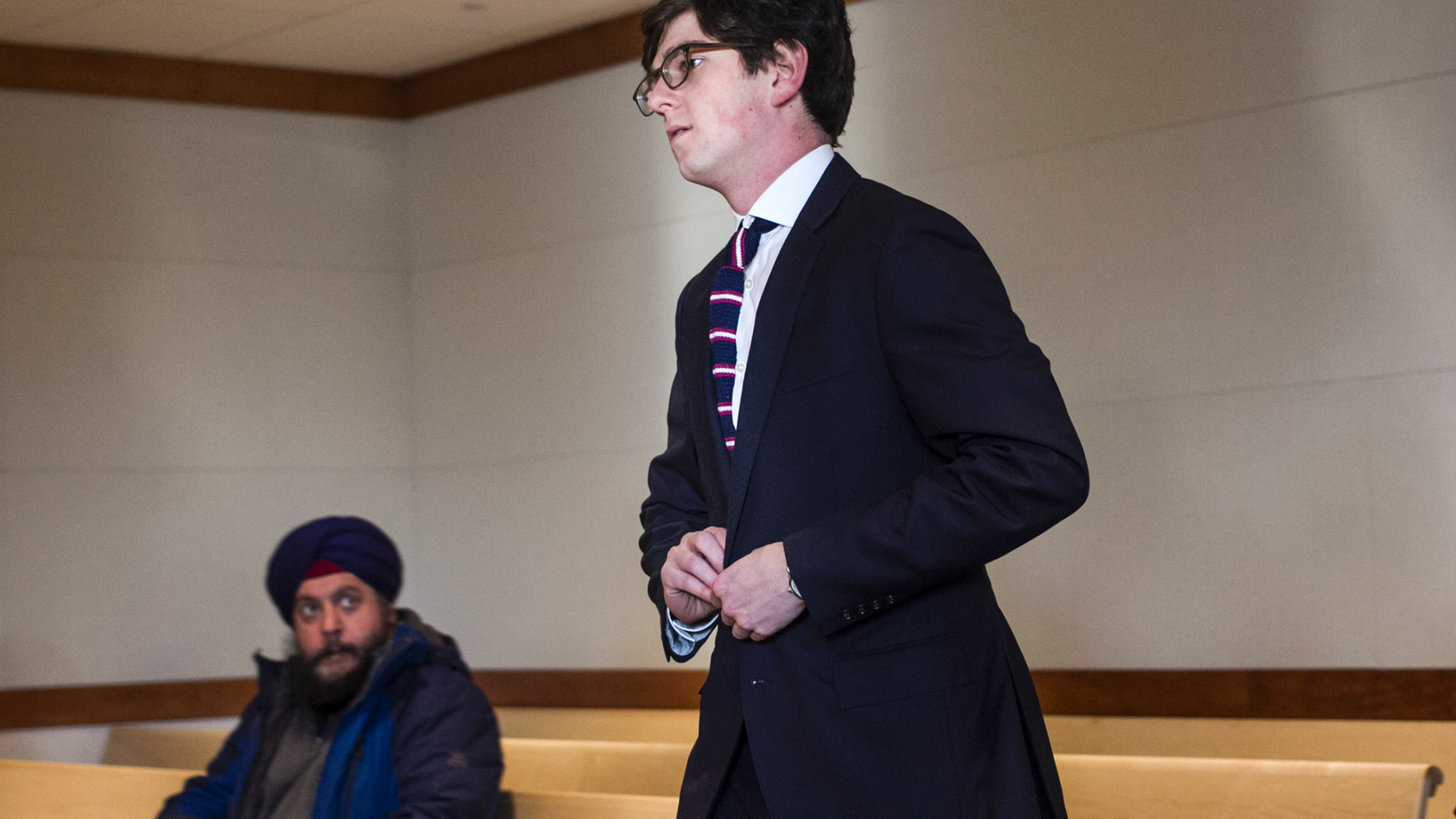 Owen Labrie arrives at Merrimack County Superior Court for his amended sentence hearing, Tuesday, Dec. 18, 2018, in Concord, N.H. A judge has refused to shorten the jail term for Labrie, a New Hampshire prep school graduate convicted of sexually assaulting a 15-year-old classmate in 2015, saying he has to report to jail for the remaining 10 months of his sentence the day after Christmas. (Geoff Forester/The Concord Monitor via AP, Pool)