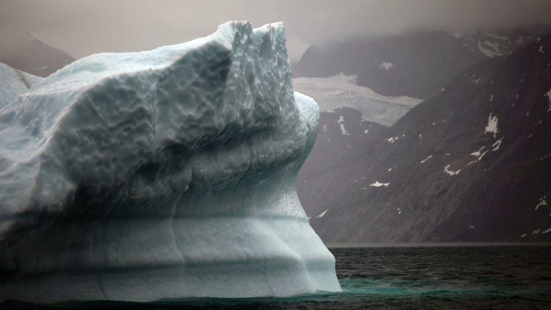 FILE- In this July 26, 2011 photo, a melting iceberg floats along a fjord leading away from the edge of the Greenland ice sheet near Nuuk, Greenland.(Associated Press)