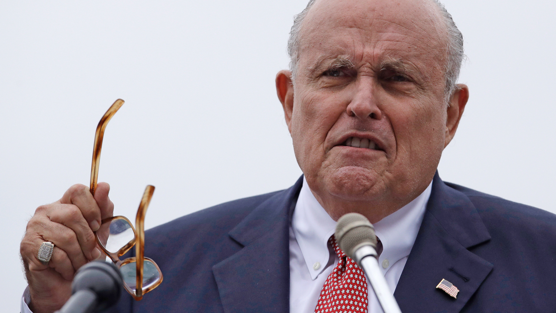 FILE - In this Aug. 1, 2018, file photo, Rudy Giuliani, an attorney for President Donald Trump, speaks in Portsmouth, N.H. The assertion that "truth isn't truth," made by Giuliani, tops a Yale Law School librarian's list of the most notable quotes of 2018. Giuliani's statement came in an August interview on NBC's "Meet the Press" when he told host Chuck Todd that Trump might "get trapped into perjury" if he were interviewed in special counsel Robert Mueller's Russia investigation. (AP Photo/Charles Krupa, File)
