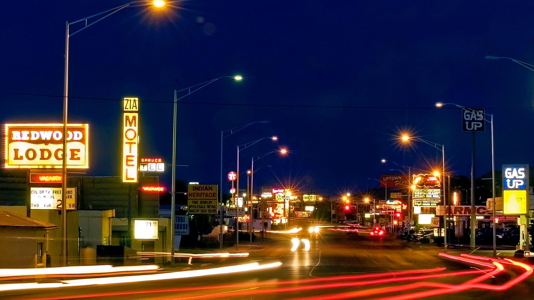 FILE - In this May 29, 2007, file photo, vehicles drive past in Zia Motel on Historic Route 66 in Gallup, N.M. The medical condition of an 8-month-old girl who police say was shot in the face at the motel remains a mystery. The girl's mother Shayanne Nelson, says her 3-year-old son found a gun and accidentally shot the infant while Nelson and her boyfriend were in the shower. (Brian Leddy/Gallup Independent via AP, File)