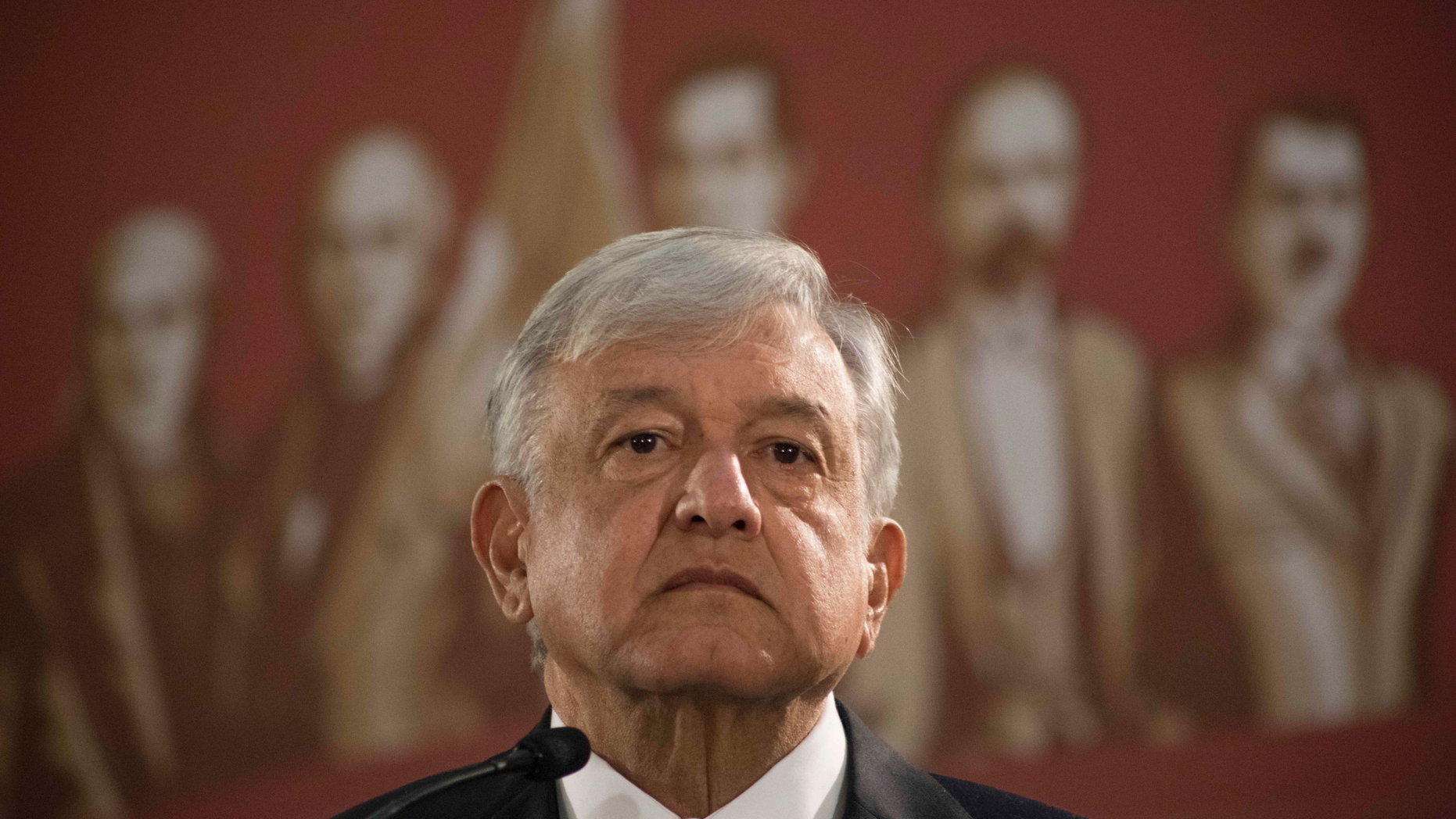 Mexico's President Andres Manuel Lopez Obrador holds his first news conference as president, which started at 7 a.m. local time in Mexico City, Monday, Dec. 3, 2018. Mexico's newly inaugurated president hit the ground running Monday with his pledge to govern as a common man and end decades of secrecy, heavy security and luxury enjoyed by past presidents. (AP Photo/Christian Palma)