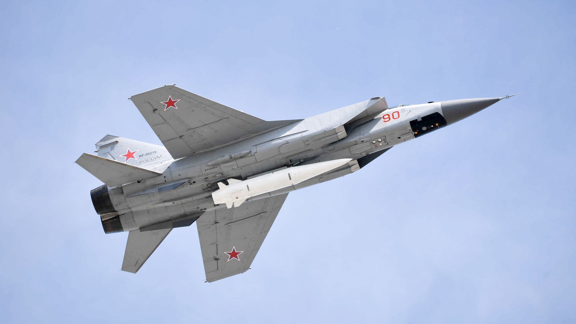 File photo - Mikoyan MiG-31K fighter jet with Kinzhal hypersonic missiles flies over Moscow's Red Square marking the 73rd anniversary of the victory over Nazi Germany in World War II.