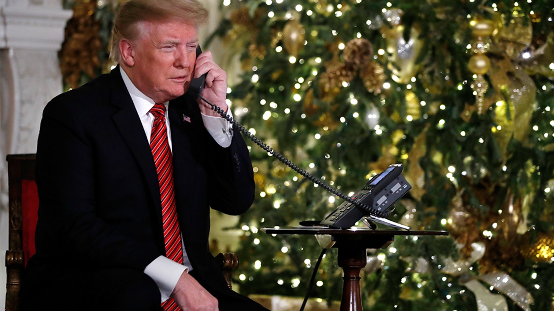 Trump, in Christmas Eve phone call, asks child if they still believe in