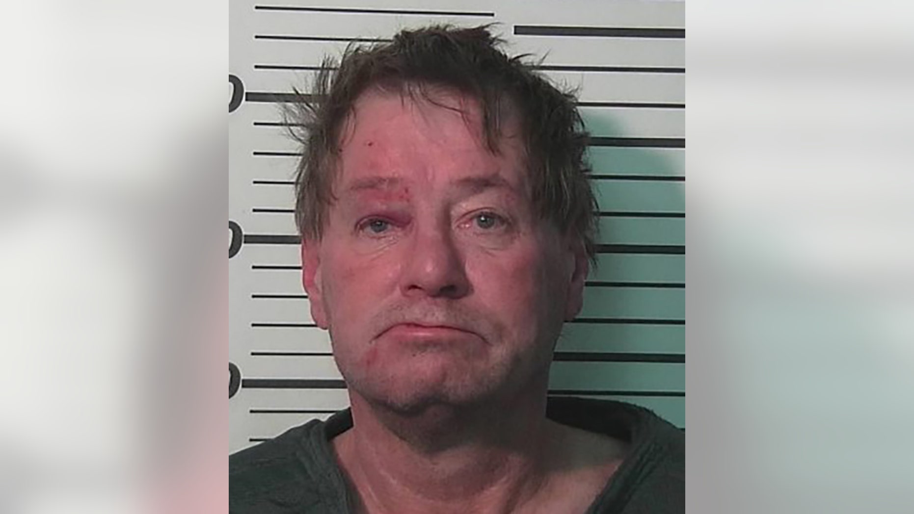 Randal Dickinson allegedly fired 16 rounds at his roommate, police say.