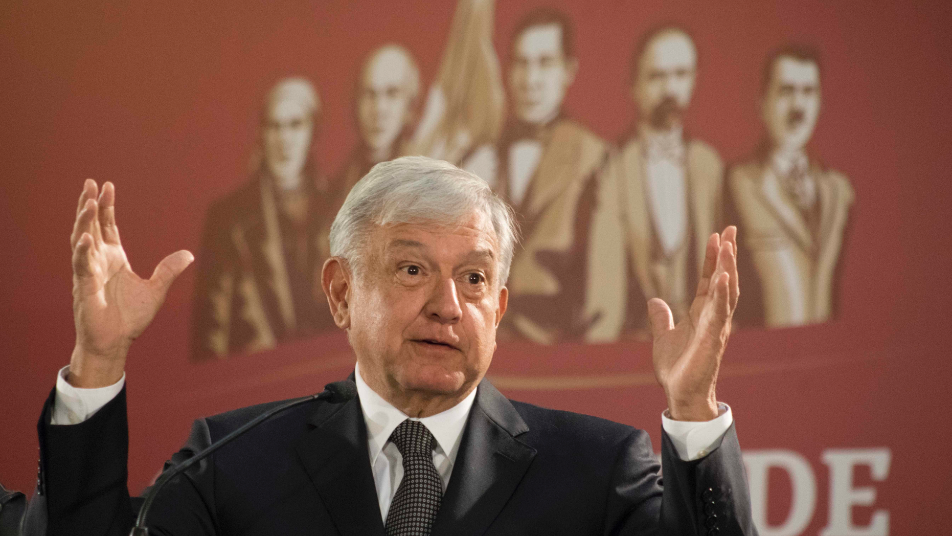 Mexico's President Andres Manuel Lopez Obrador holds his first news conference as president, which started at 7 a.m. local time in Mexico City, Monday, Dec. 3, 2018. Mexico's newly inaugurated president hit the ground running Monday with his pledge to govern as a common man and end decades of secrecy, heavy security and luxury enjoyed by past presidents. (AP Photo/Christian Palma)