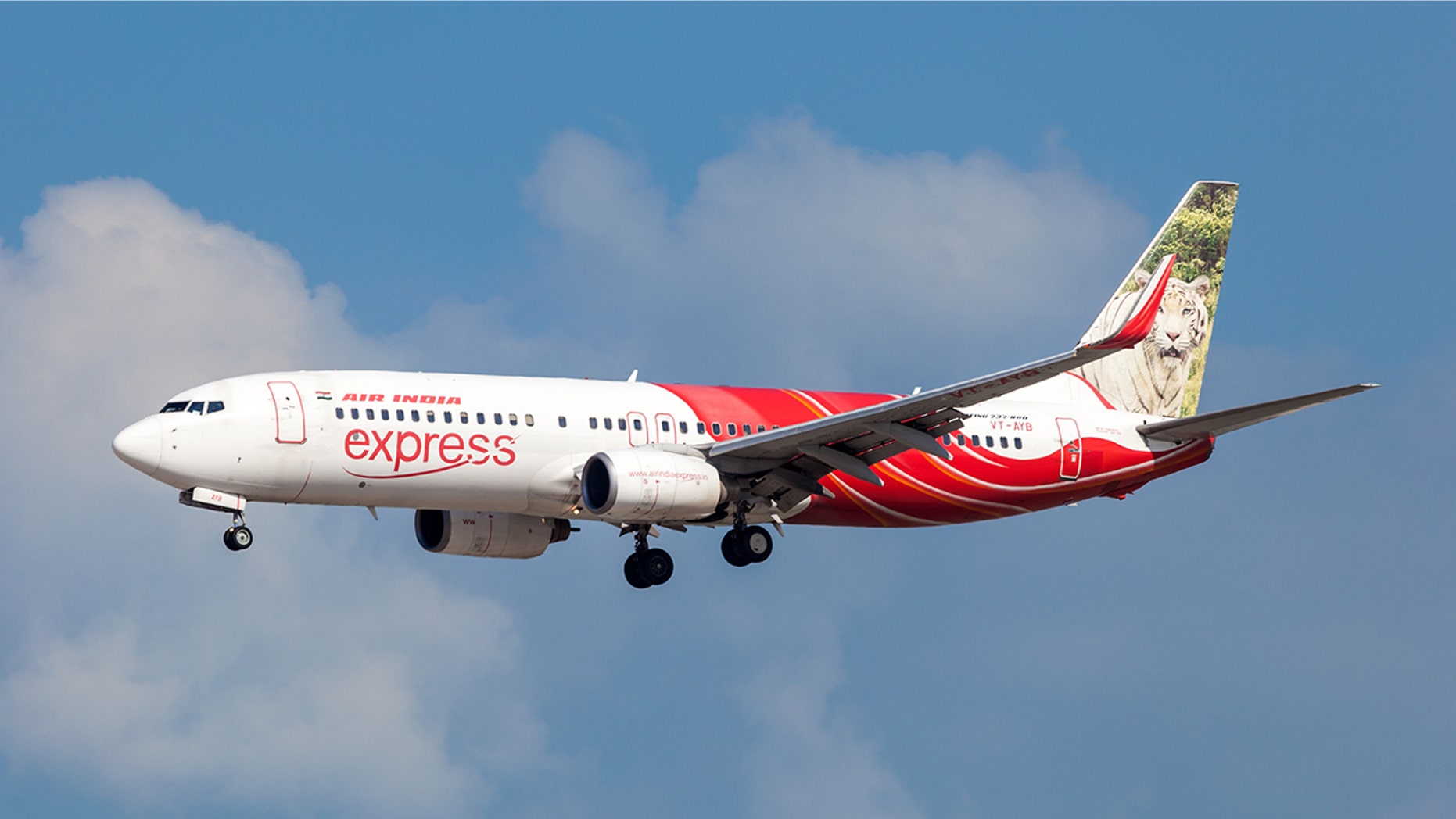 An Air India Express passenger stripped naked and started walking down the aisle, according to reports.
