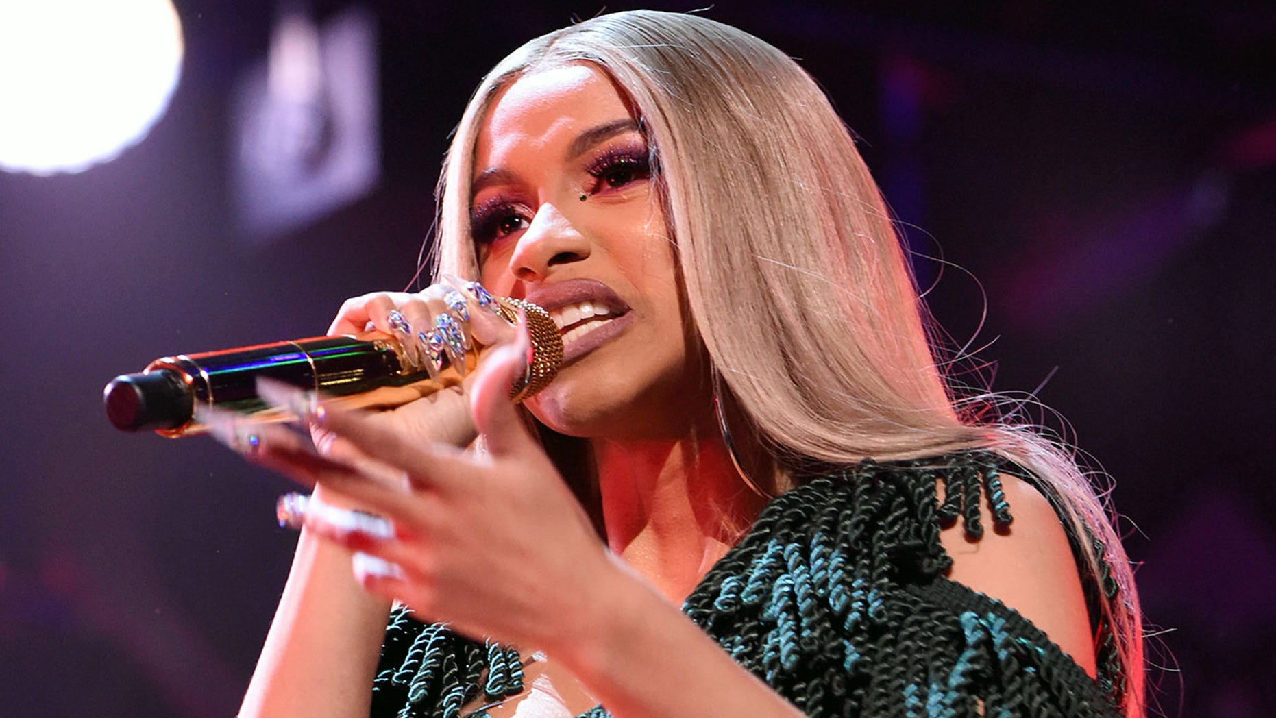 Cardi B lashes out about harassment, pressures of fame in expletive