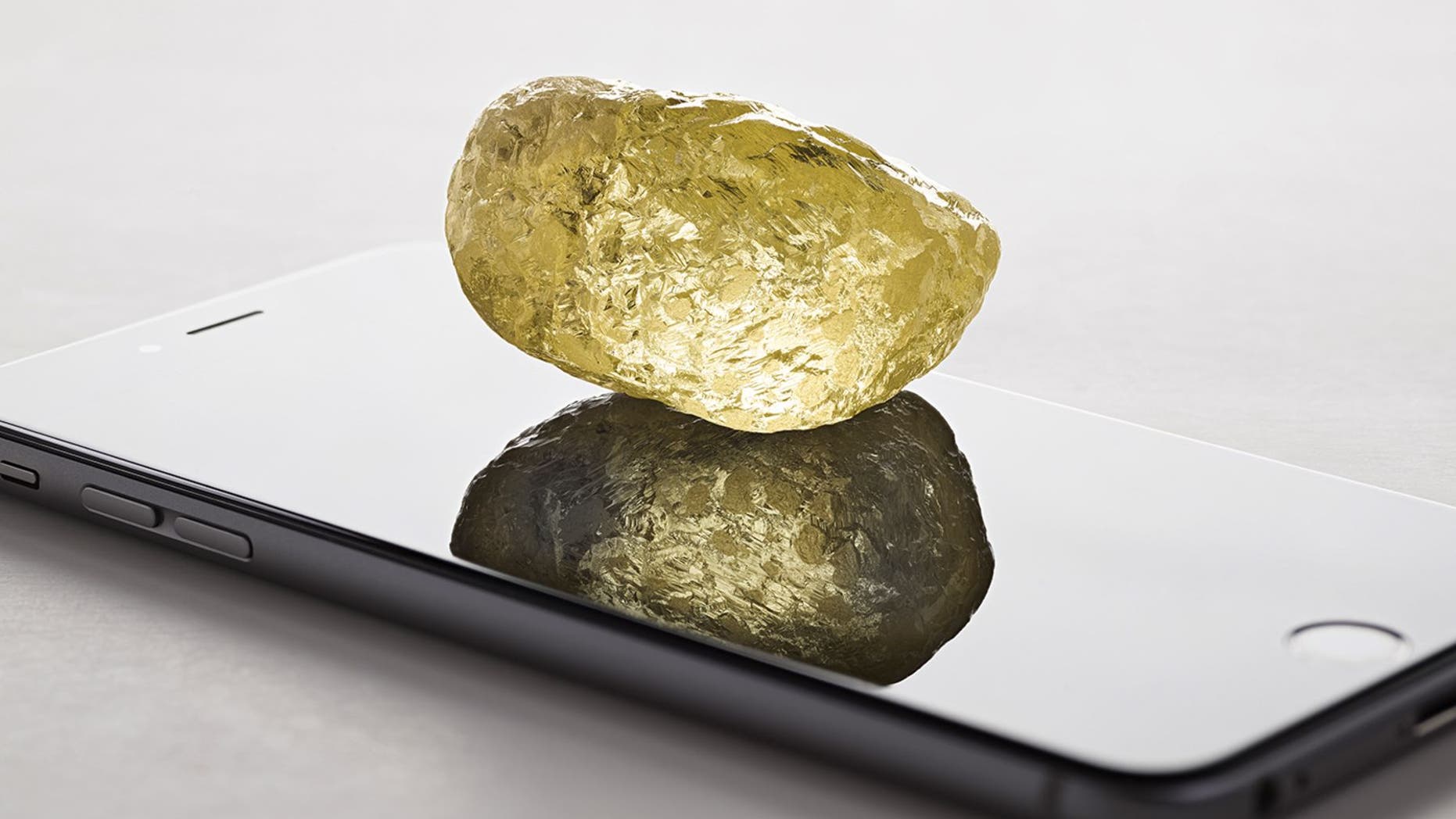 The yellow diamond is about the size of a chicken egg--