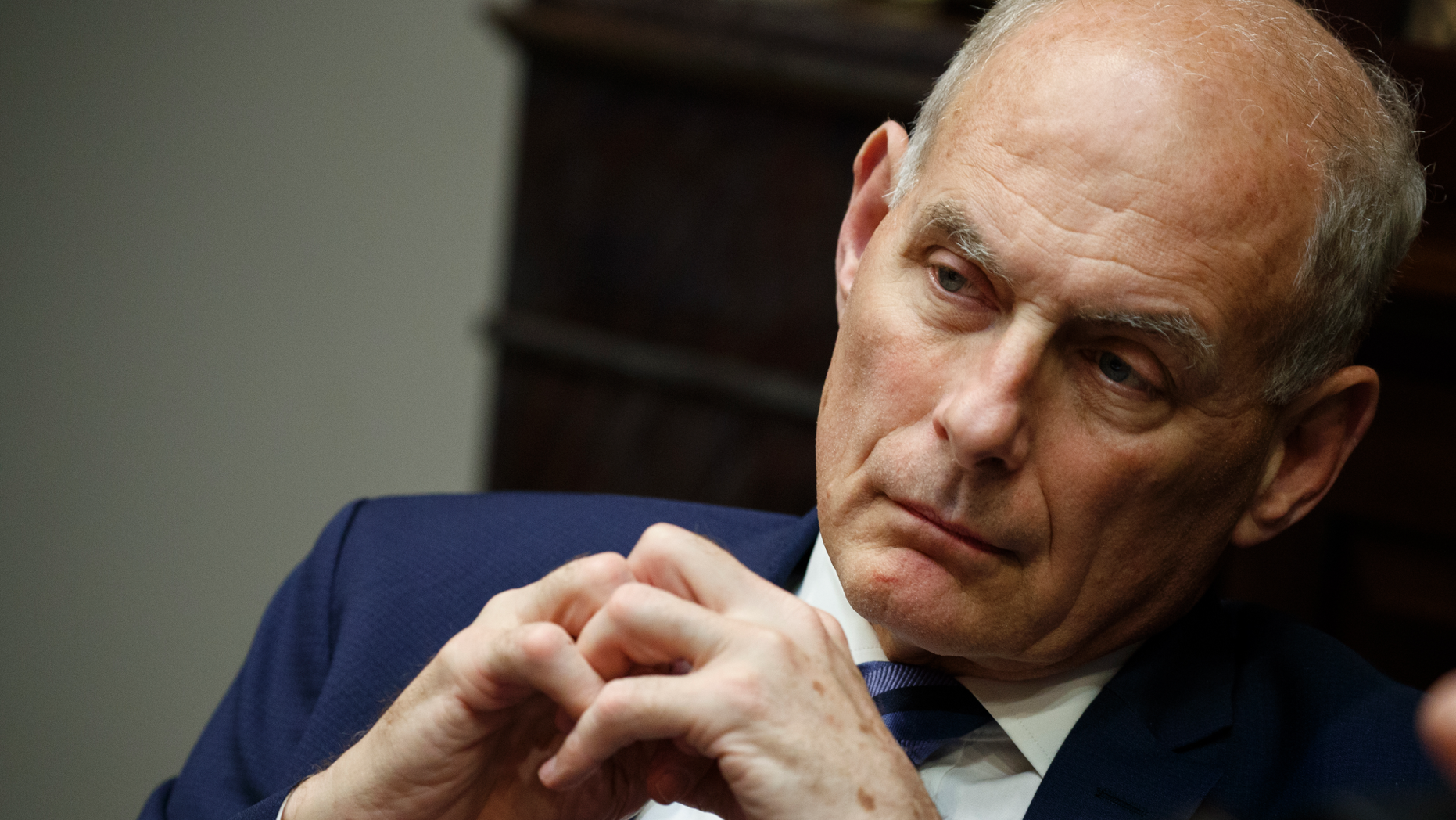 In this June 21, 2018 photo, White House chief of staff John Kelly listens as President Donald Trump speaks during a lunch with governors in the Roosevelt Room of the White House in Washington. Trump says chief of staff John Kelly will leave his job at the end of the year.(AP Photo/Evan Vucci)