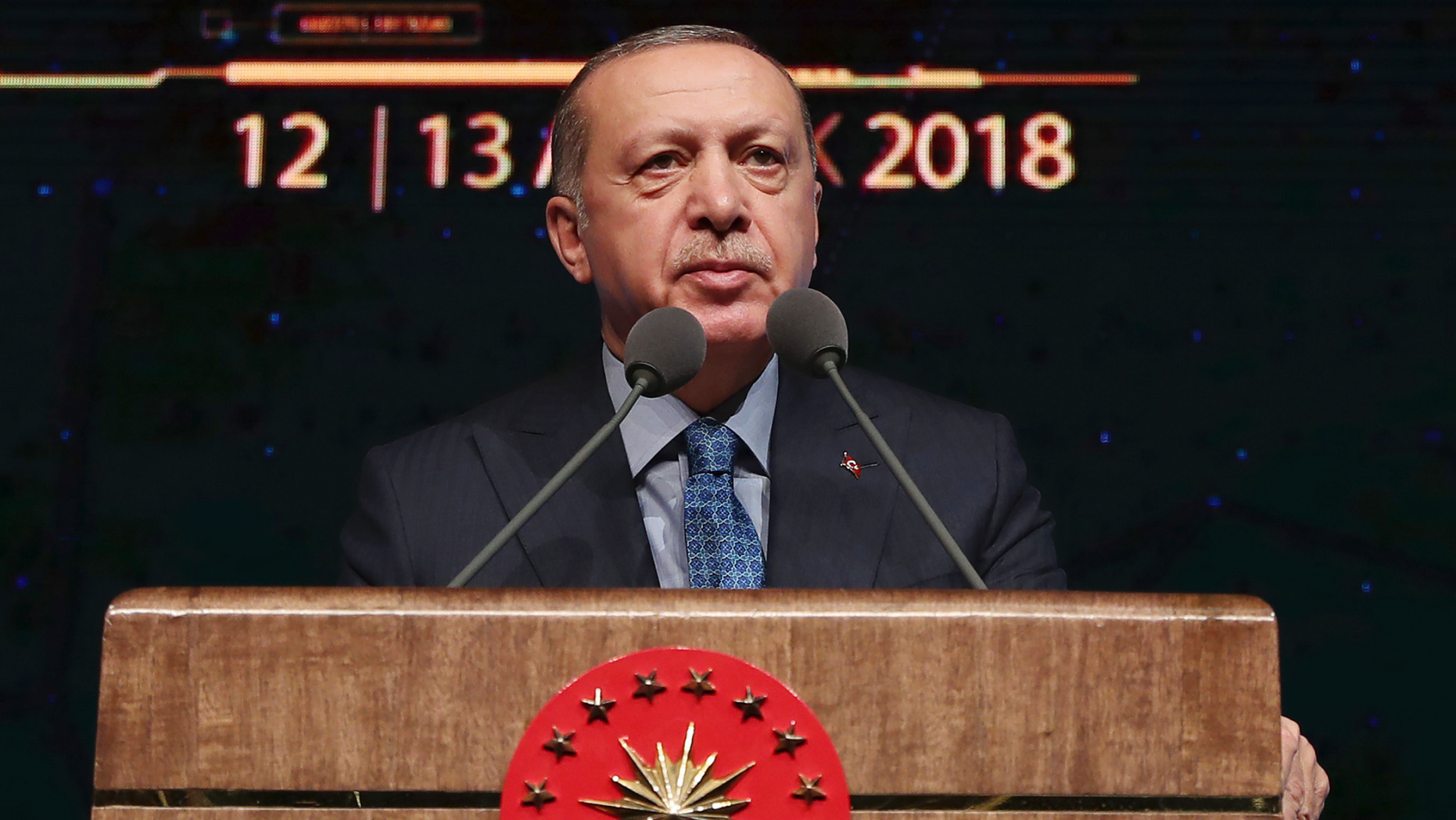 Turkey's President Recep Tayyip Erdogan delivers a speech during a defence industry meeting event in Ankara, Turkey, Wednesday, Dec. 12, 2018. Erdogan said Turkey will begin