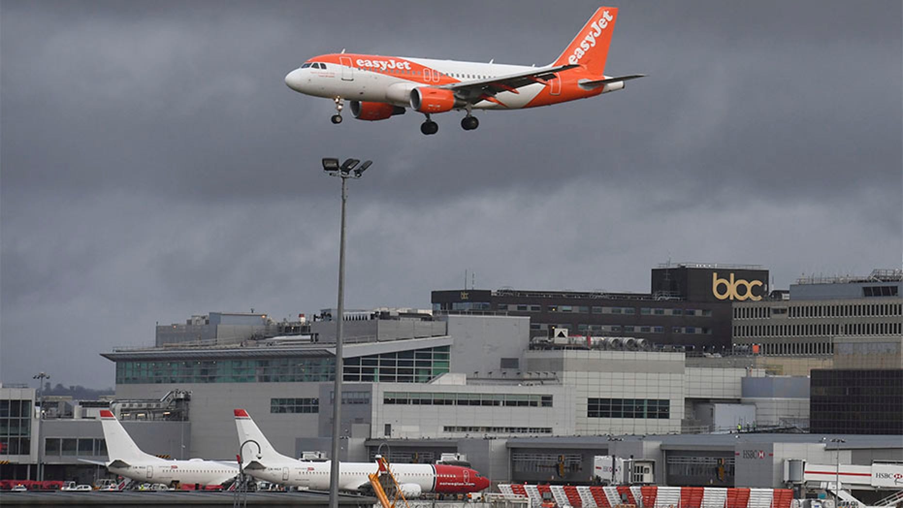 An EasyJet plane on its final approach before landing at Gatwick airport near London on Friday.