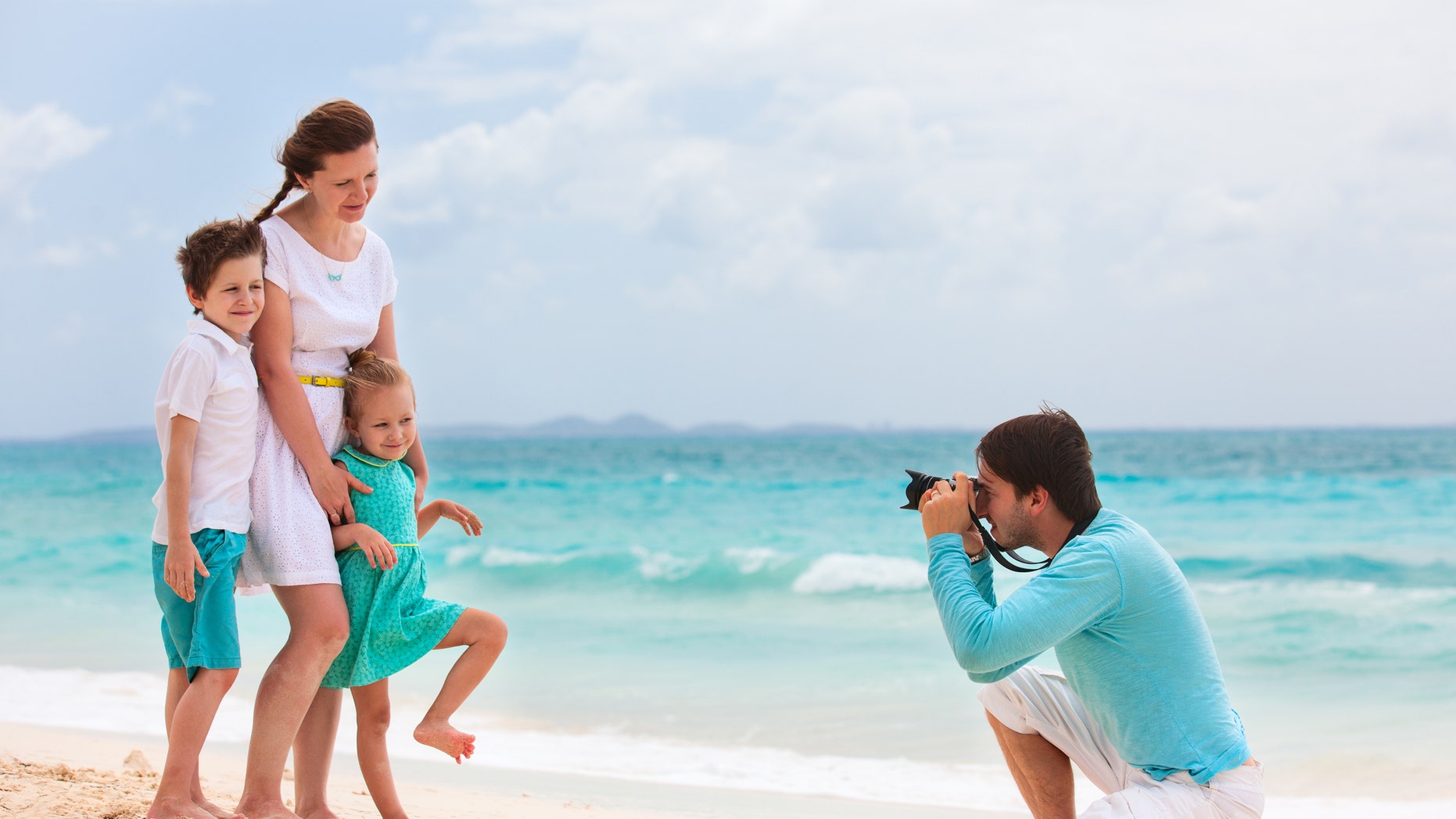 A British family is hiring a professional photographer to follow them around the world for a year – and the money and the travel experiences aren't the only perks.
