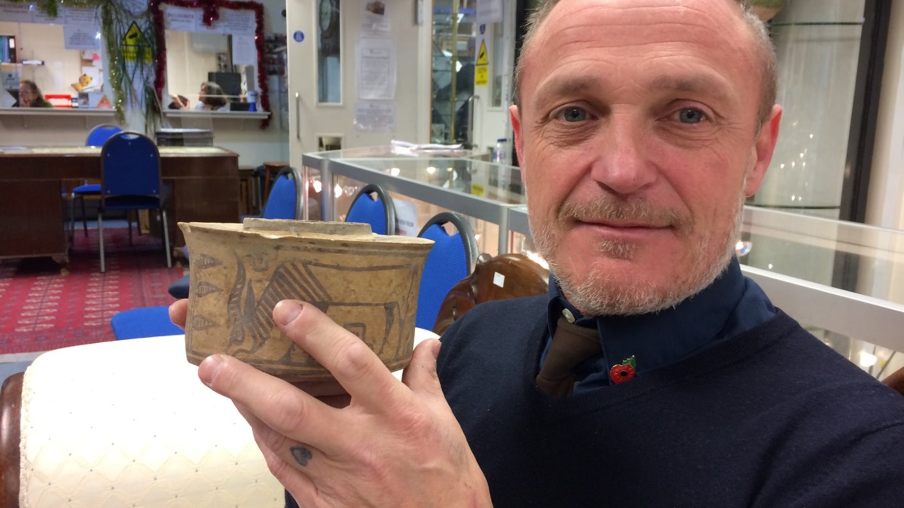 Who knew? This pottery jar being sold at a flea market was made about 2,000 years before the birth of Christ.