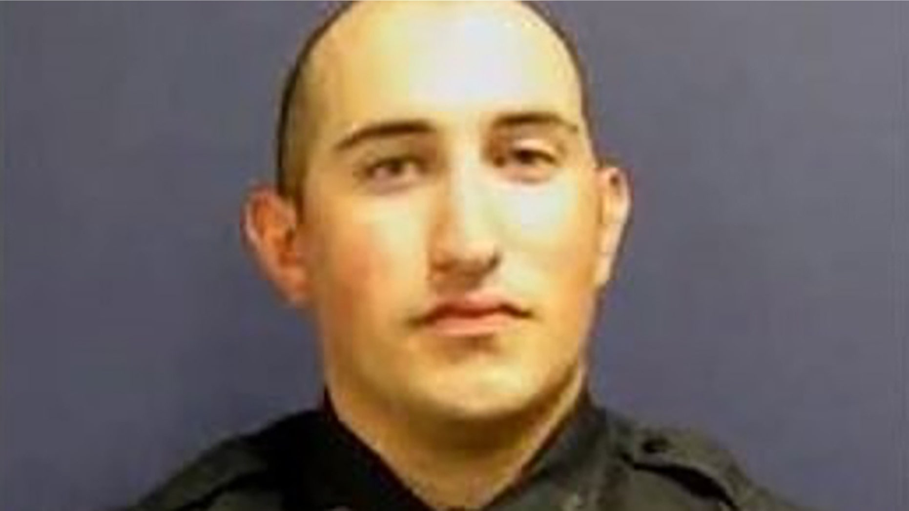 Officer John Daily suffered severe burns in a crash, authorities say. (Houston Police Department)