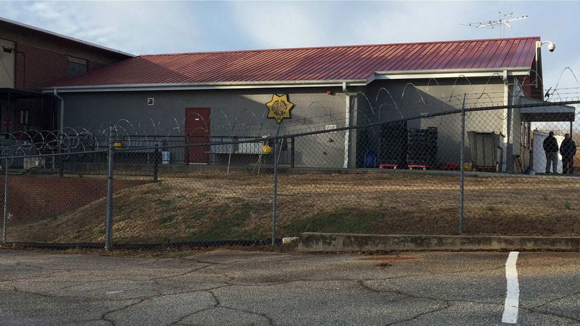 One inmate was killed by a homeowner and another was taken into custody after escaping from a prison in South Carolina early Tuesday, officials said.
