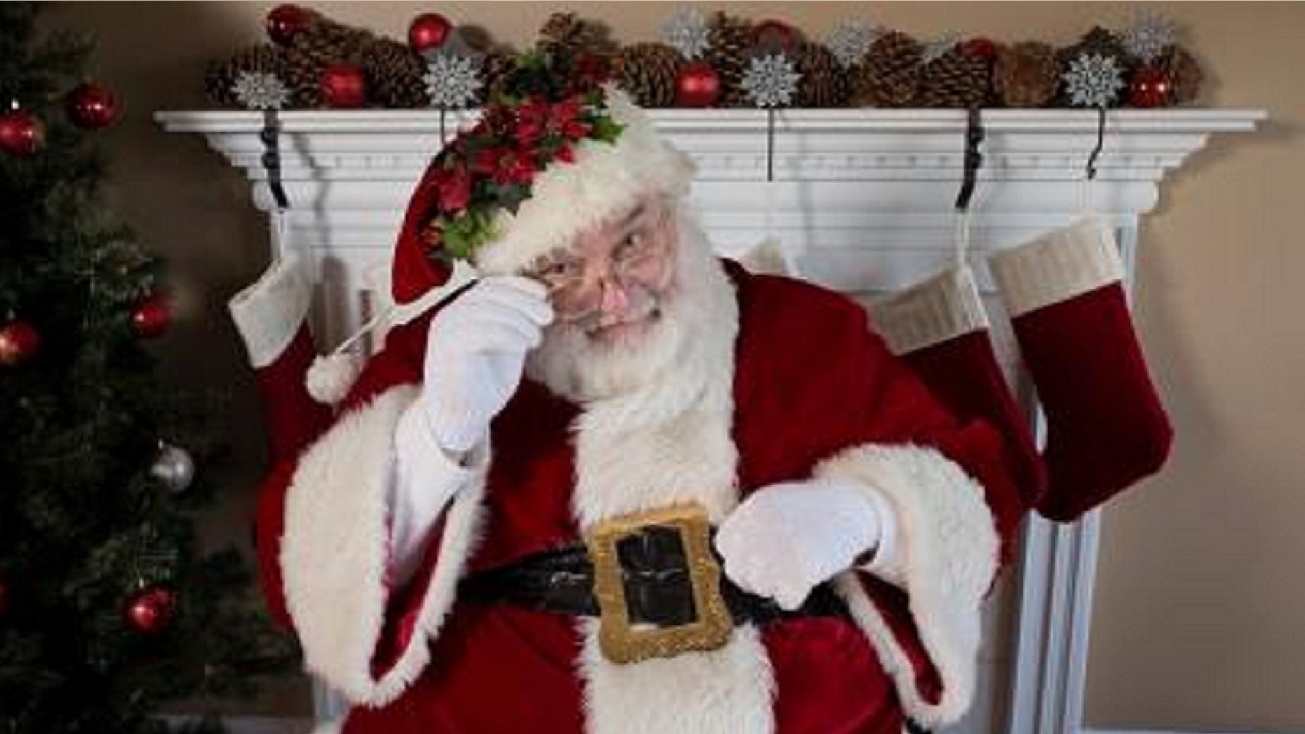 FILE: Santa visits a home. A substitute teacher in New Jersey will not be returning to the Montville Township Public Schools, the superintendent said Tuesday.