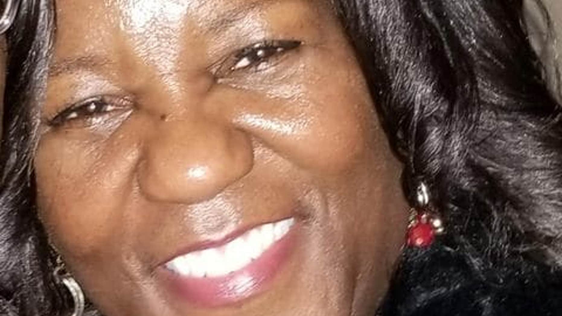 Jacquelyn Smith, 52, was fatally stabbed early Sunday after giving money to a woman who appeared to be a panhandler.
