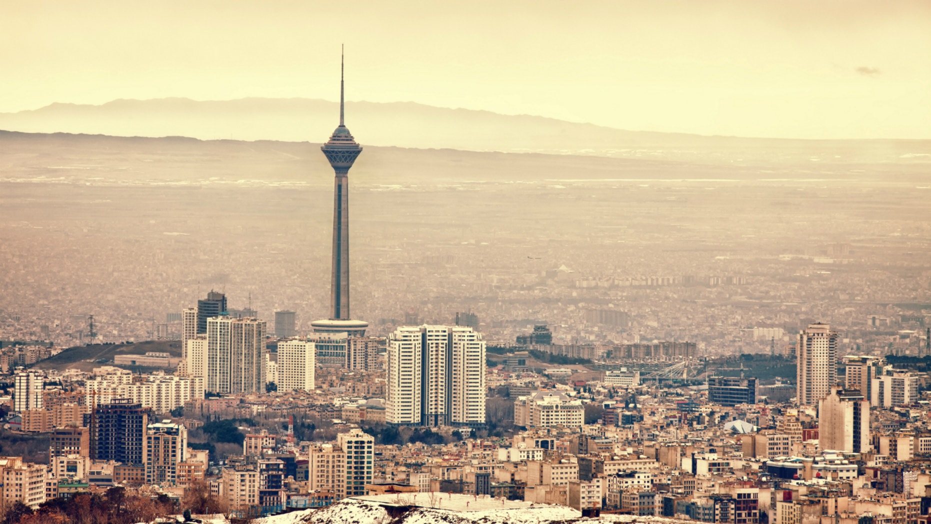 As groundwater drains from rock under Tehran, the city is paying a steep price.