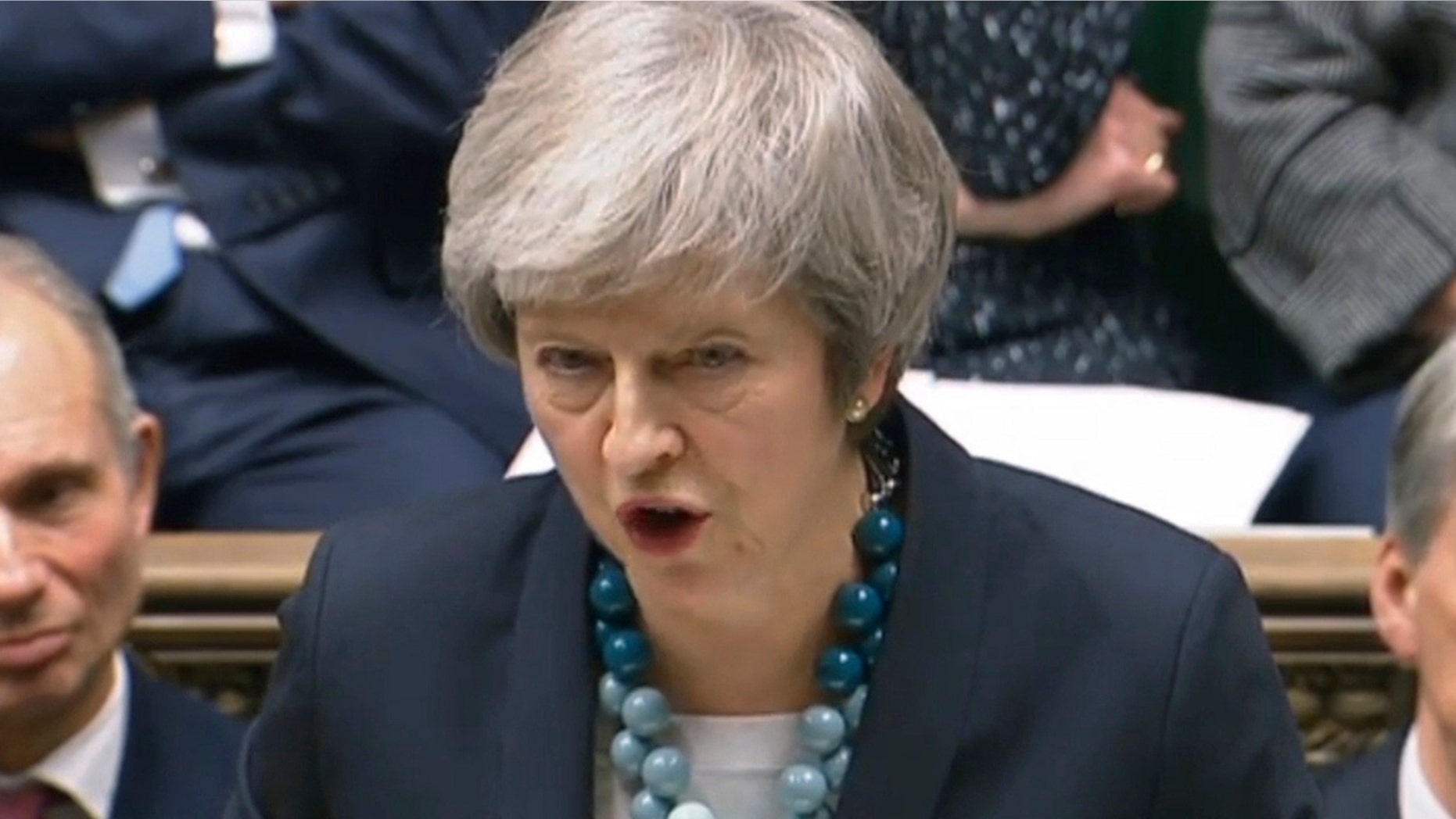 A British Conservative Party official says Prime Minister Theresa May will face a no-confidence vote from party lawmakers. (PA via AP)